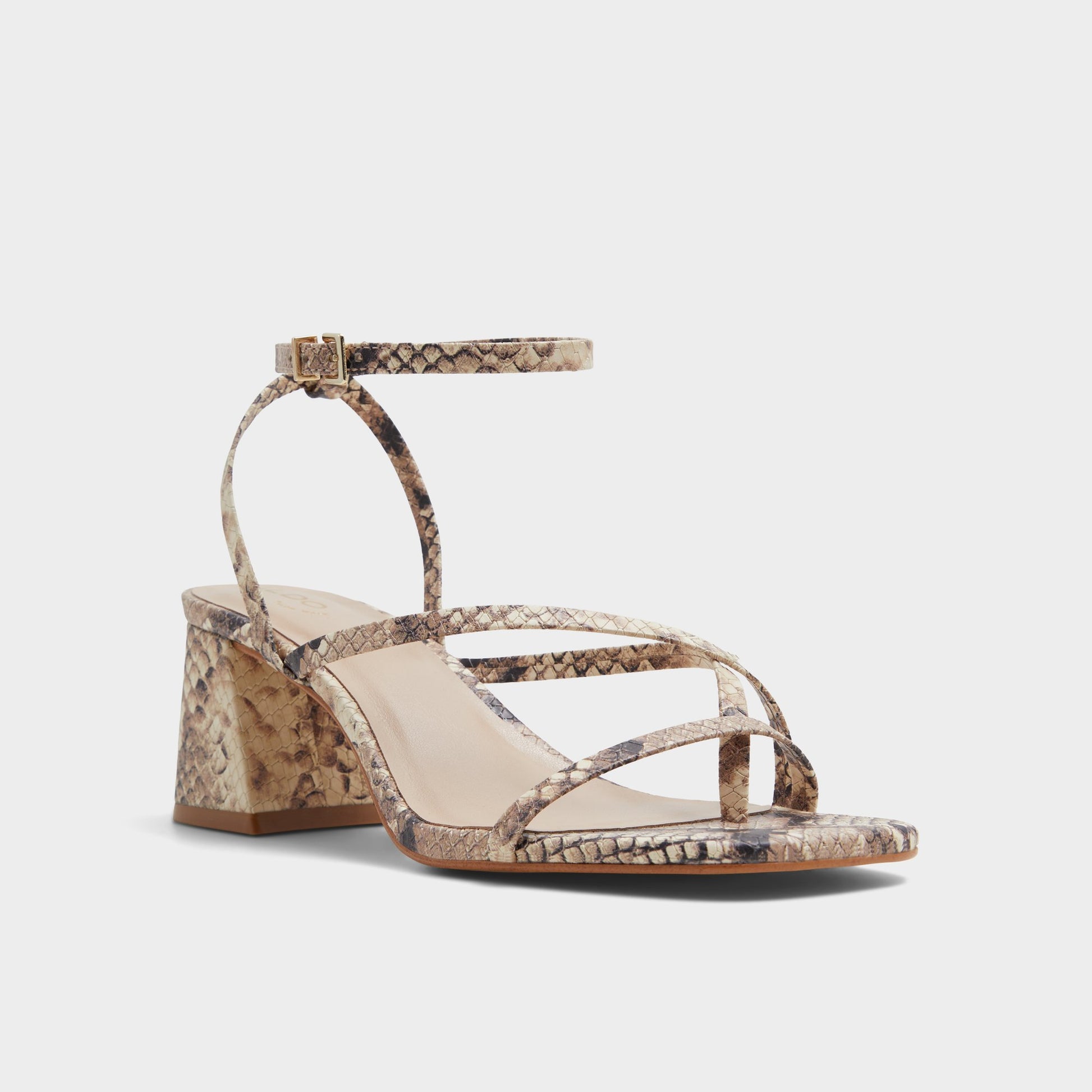 Three-quarter angle of Brown Overflow Adrauder Strappy block heeled sandal's front side