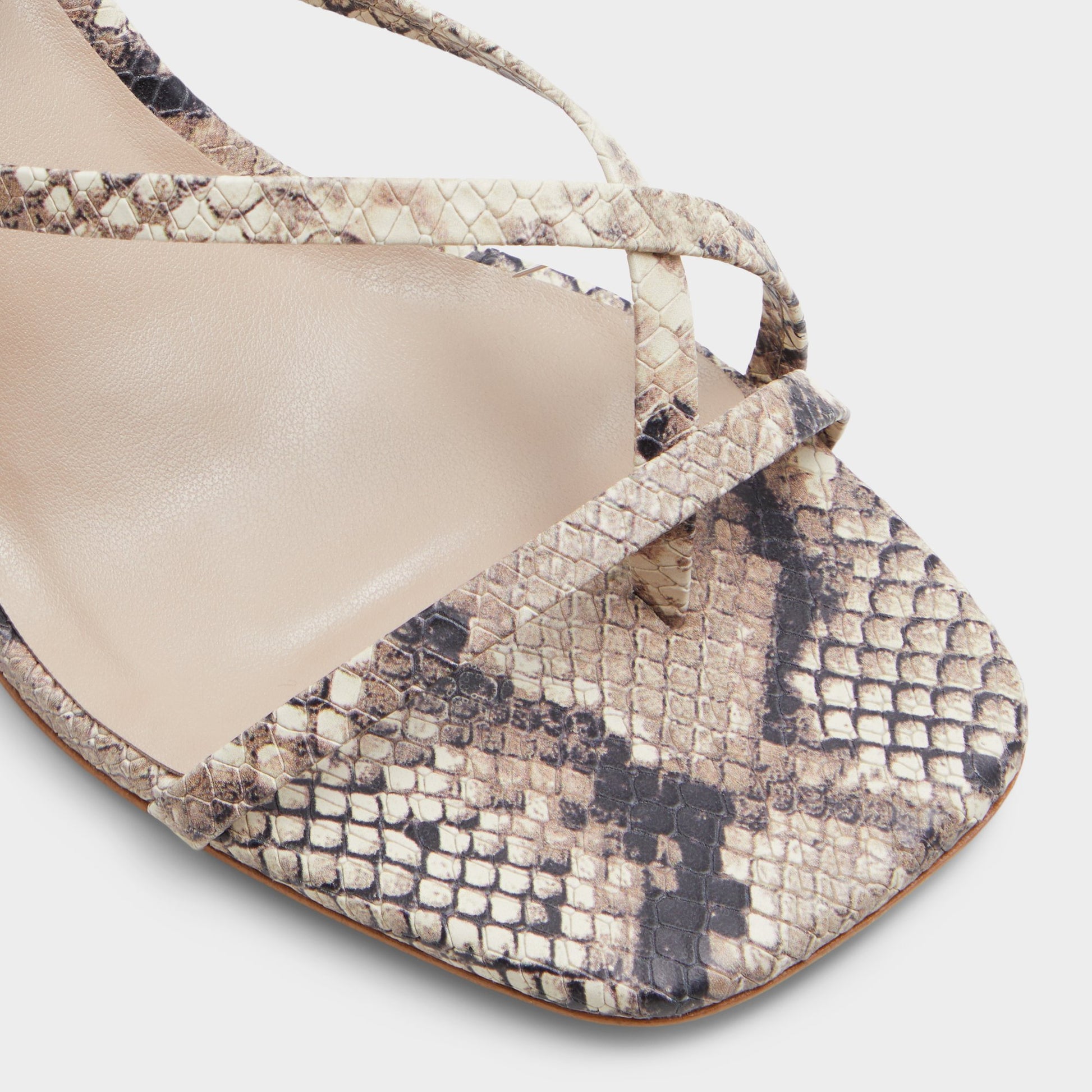 Close-up of the Brown Overflow Adrauder Strappy block heeled sandal