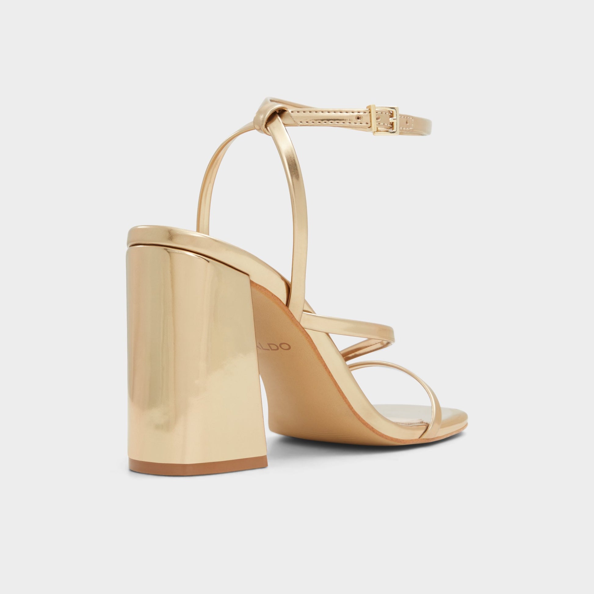 Three-quarter angle of Gold Laurader Strappy heeled sandal's back side