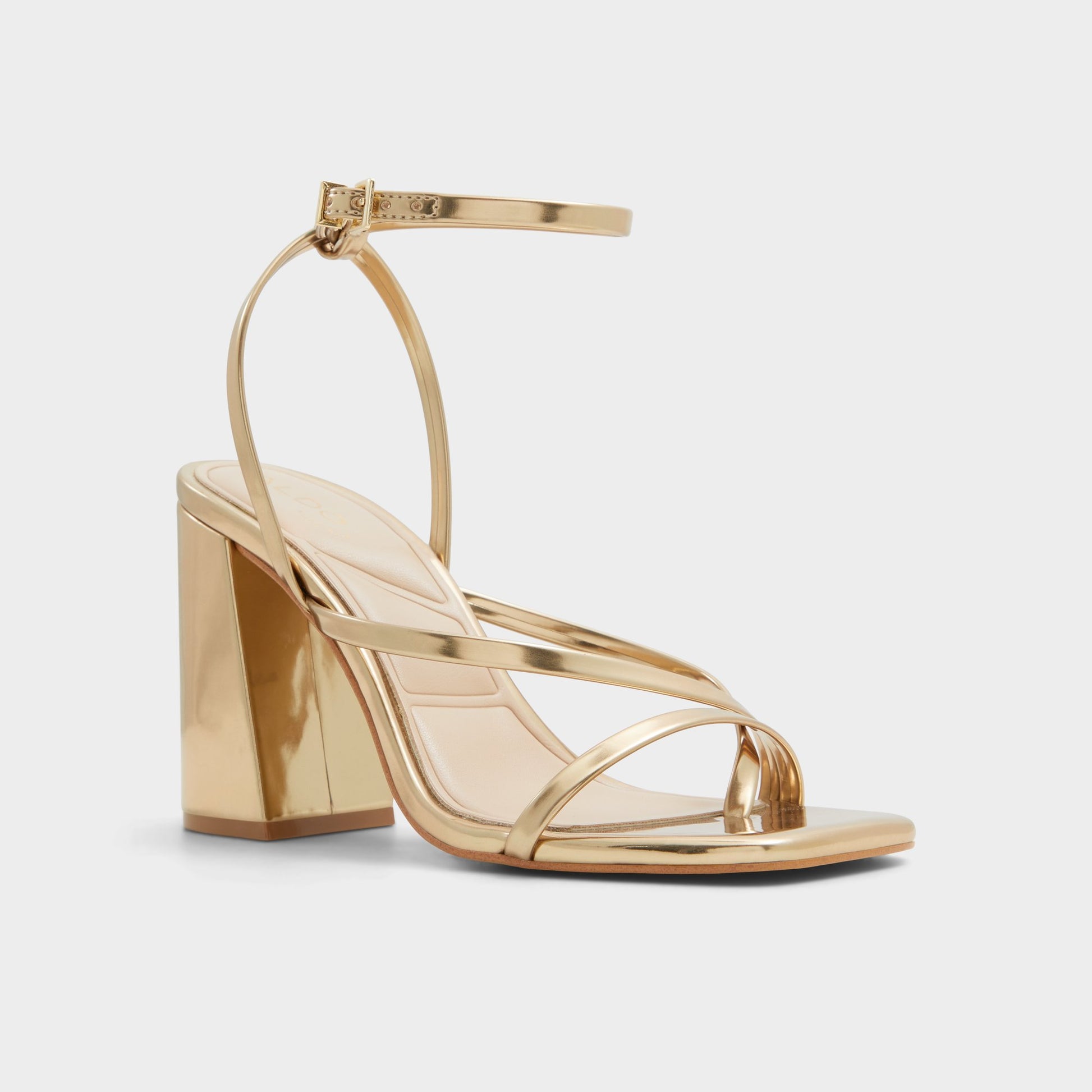 Three-quarter angle of Gold Laurader Strappy heeled sandal's front side