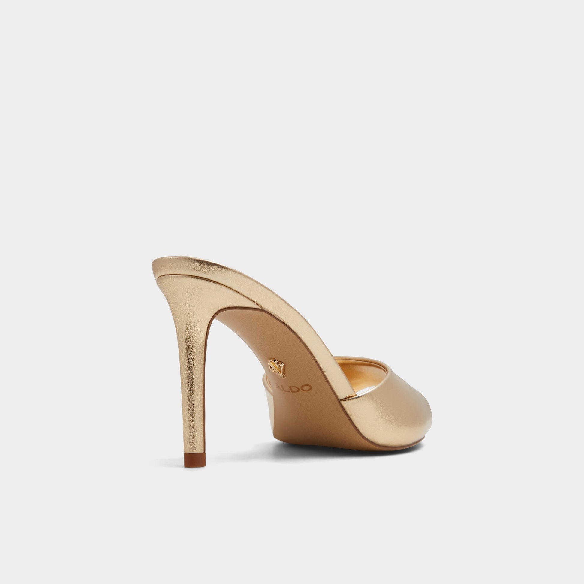 Three-quarter angle of Gold Marita Heeled mule's back side
