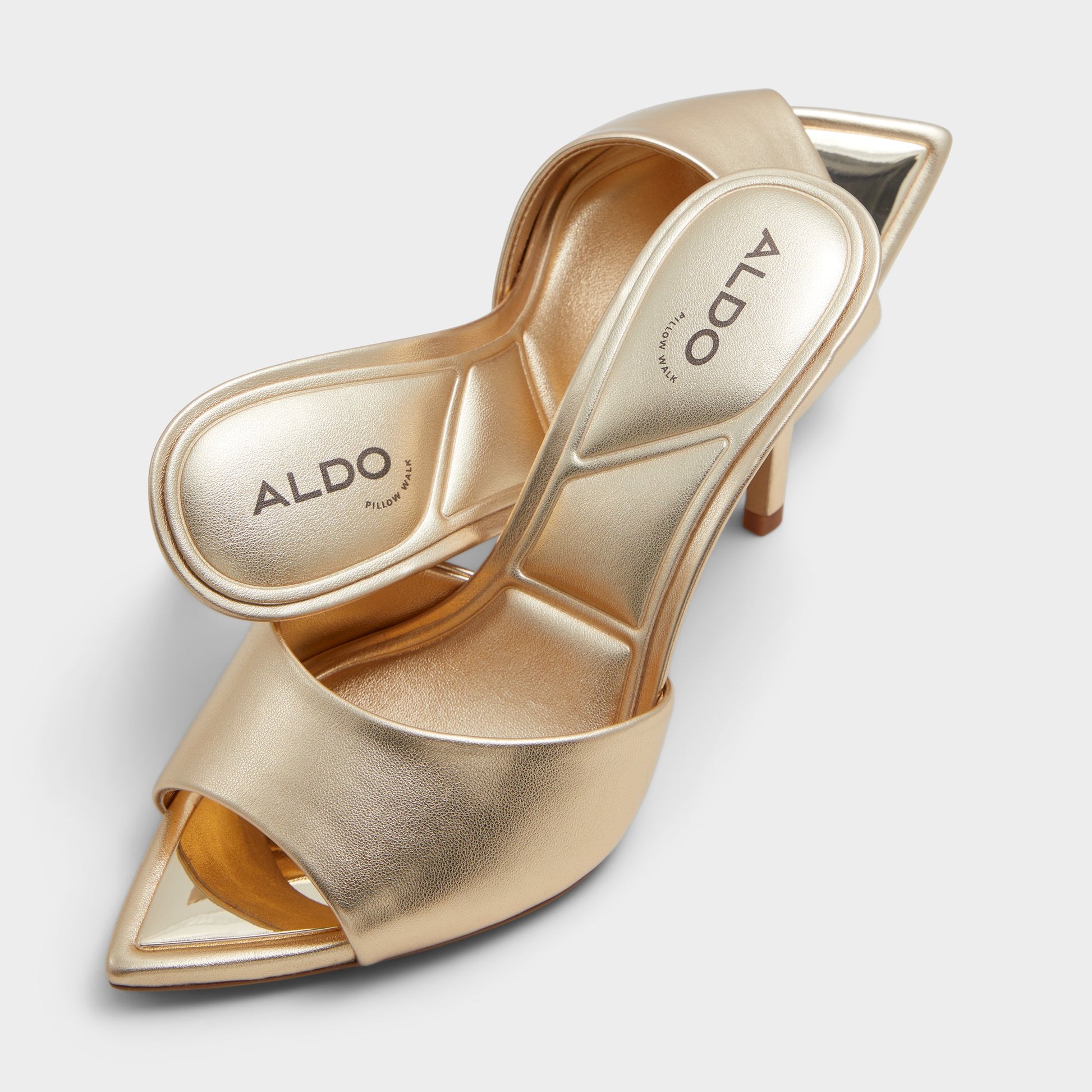 Highlighted view of a pair of Gold Marita Heeled mules
