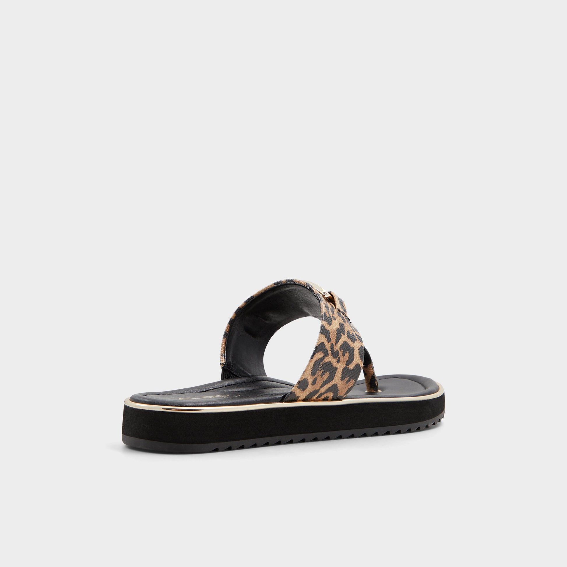 Three-quarter angle of Brown Multi Adirahar T-strap sandal's back side