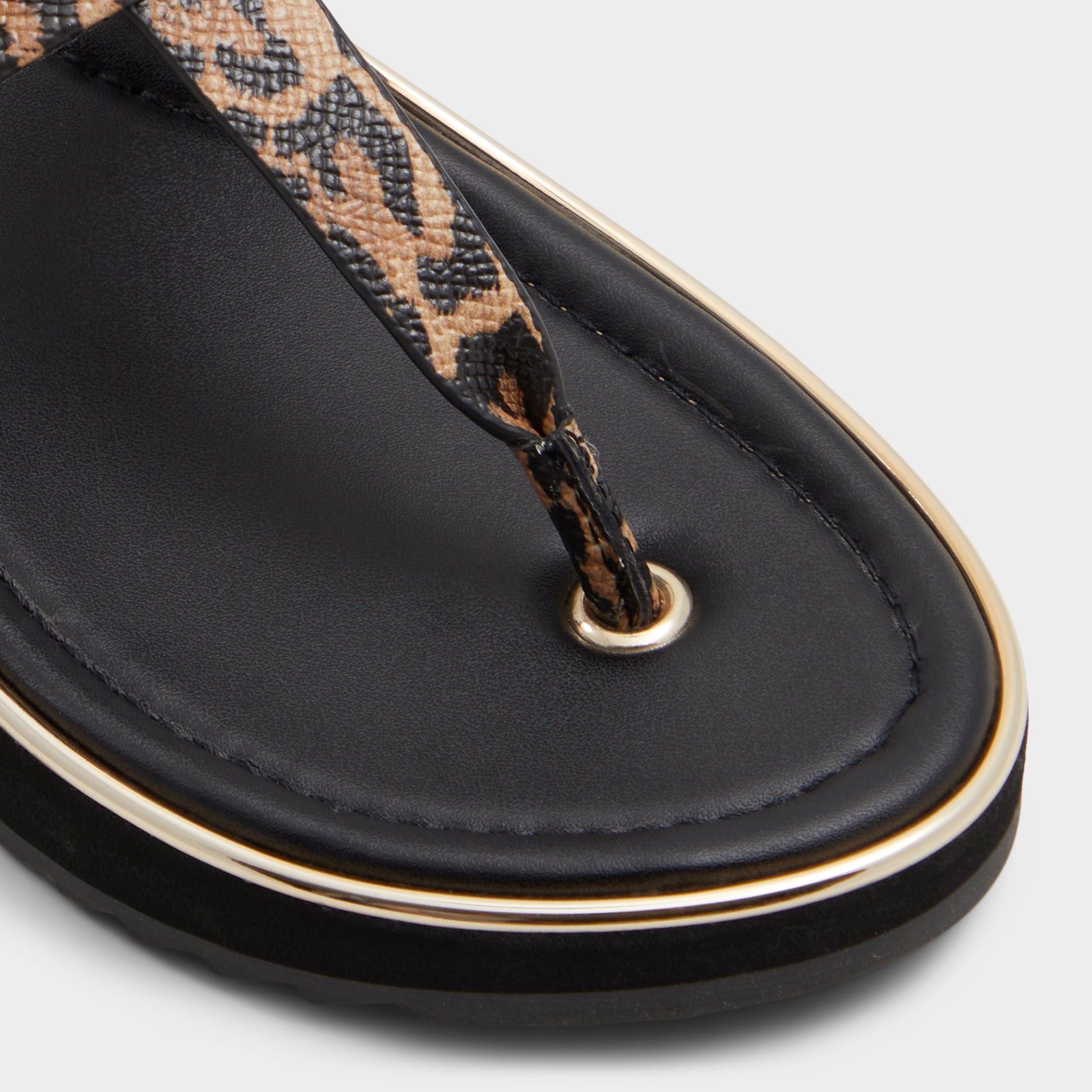 Close-up of the Brown Multi Adirahar T-strap sandal