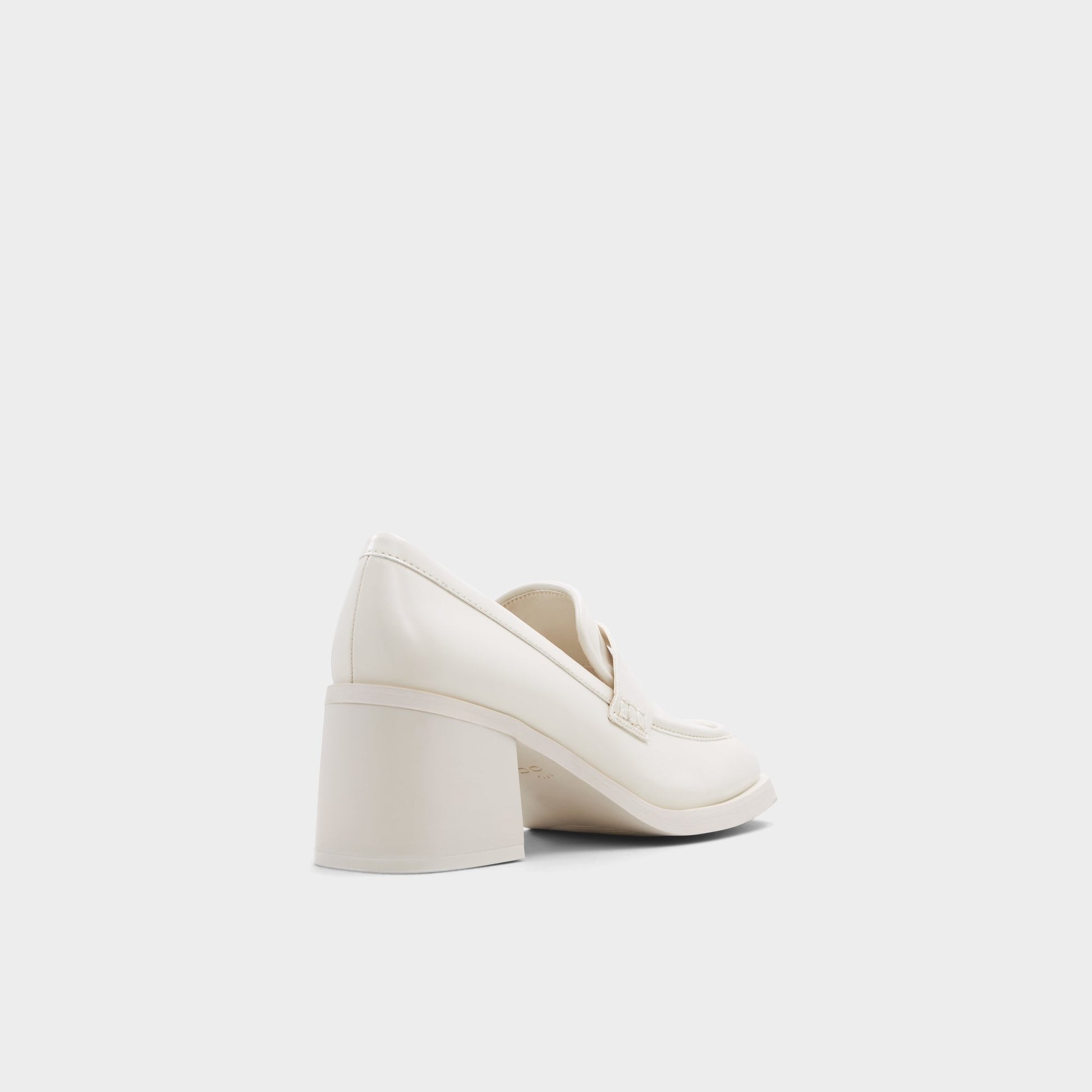 Three-quarter angle of Open White Naila Heeled loafer's back side