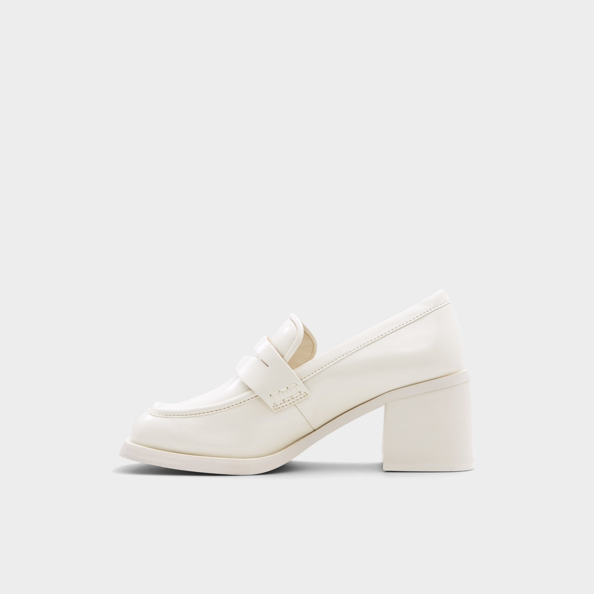 Side view of Open White Naila Heeled loafer