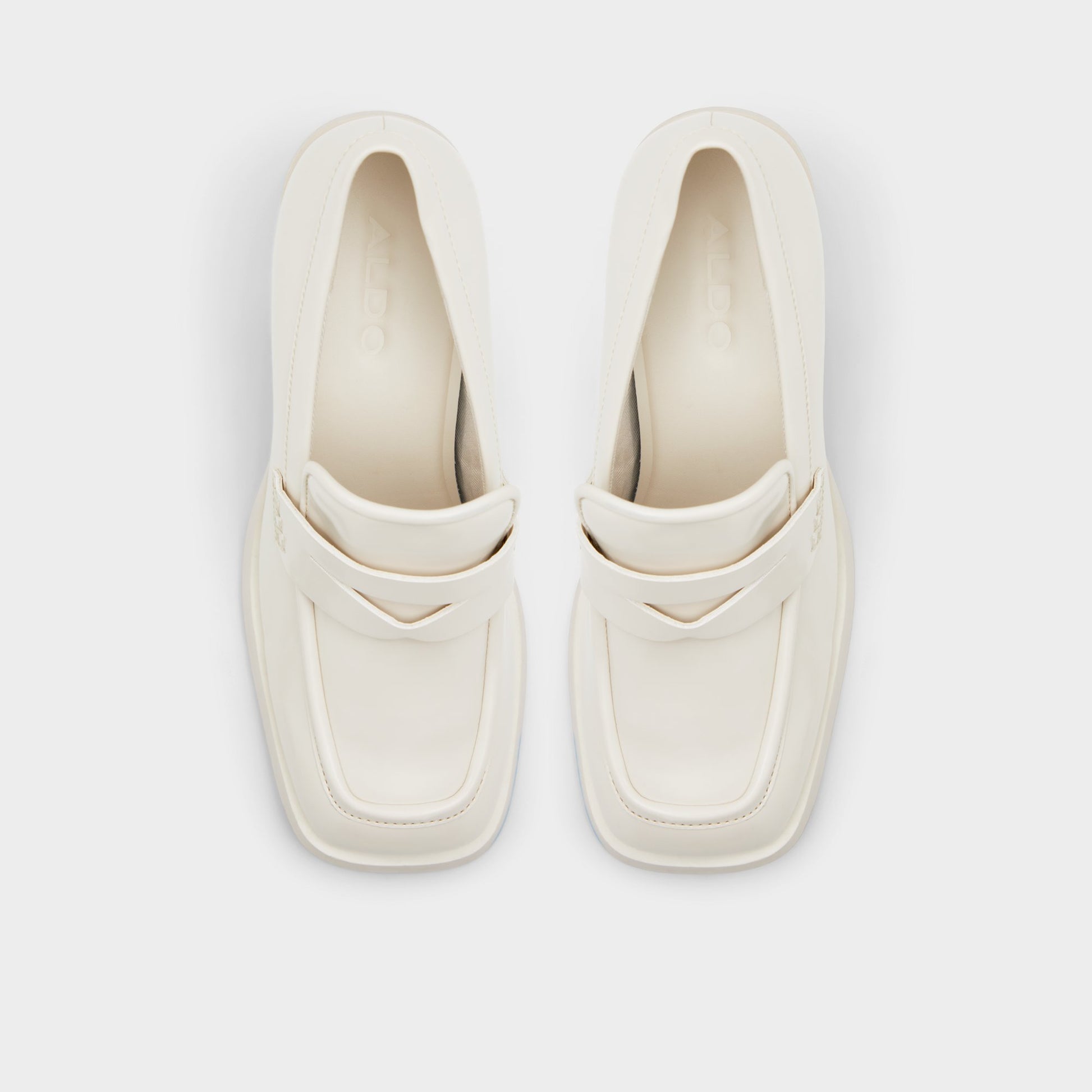 Top-down view of the Open White Naila Heeled loafer