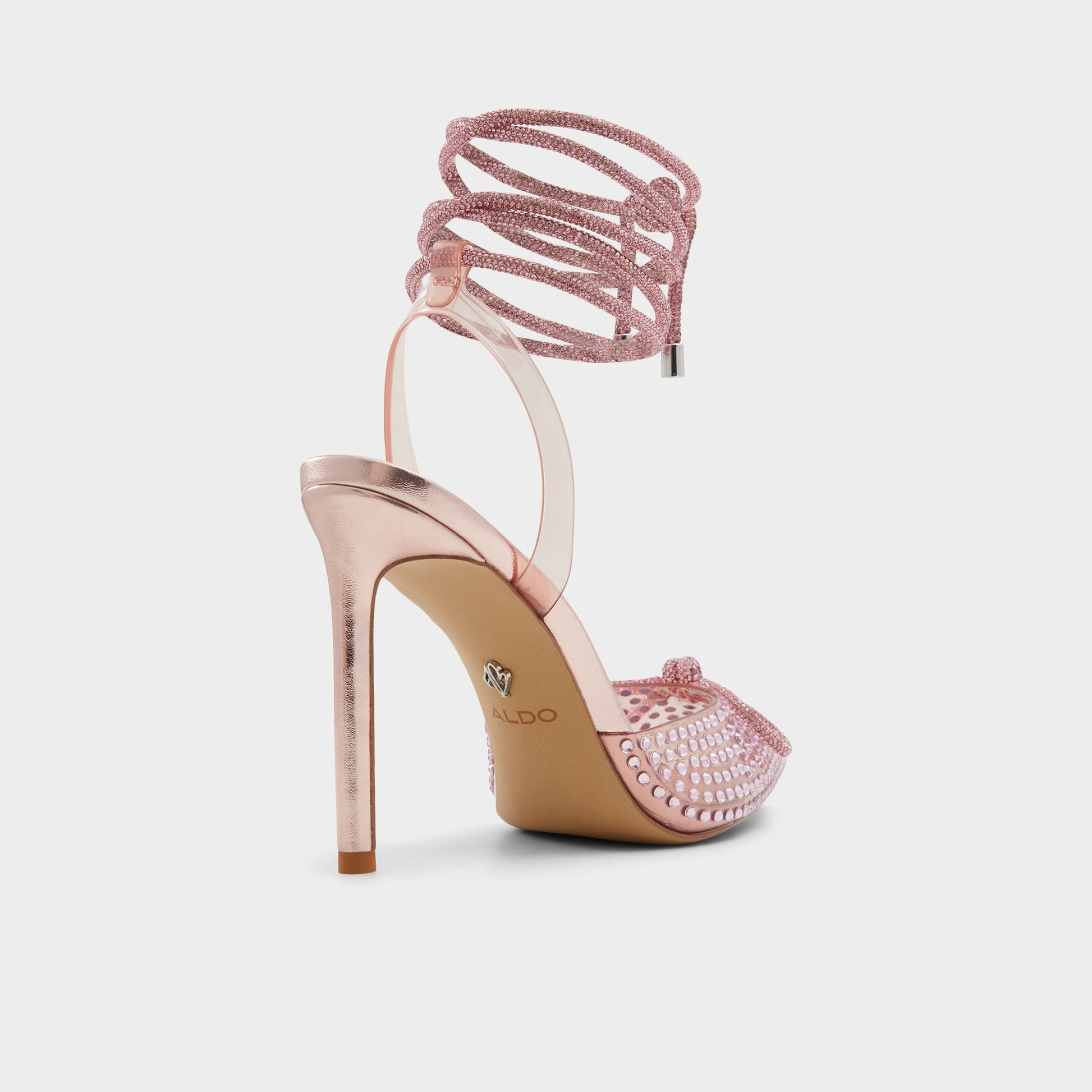 Three-quarter angle of Pink Tenzin Strappy heeled shoe's back side