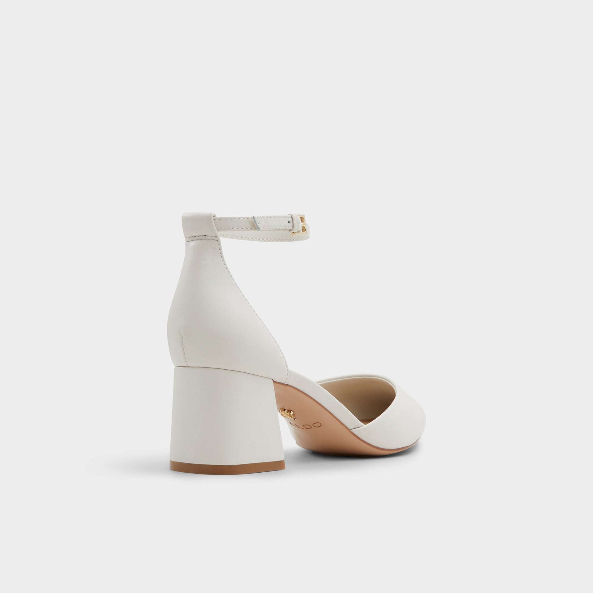 Three-quarter angle of White/Bone Uneral High heeled shoe's back side