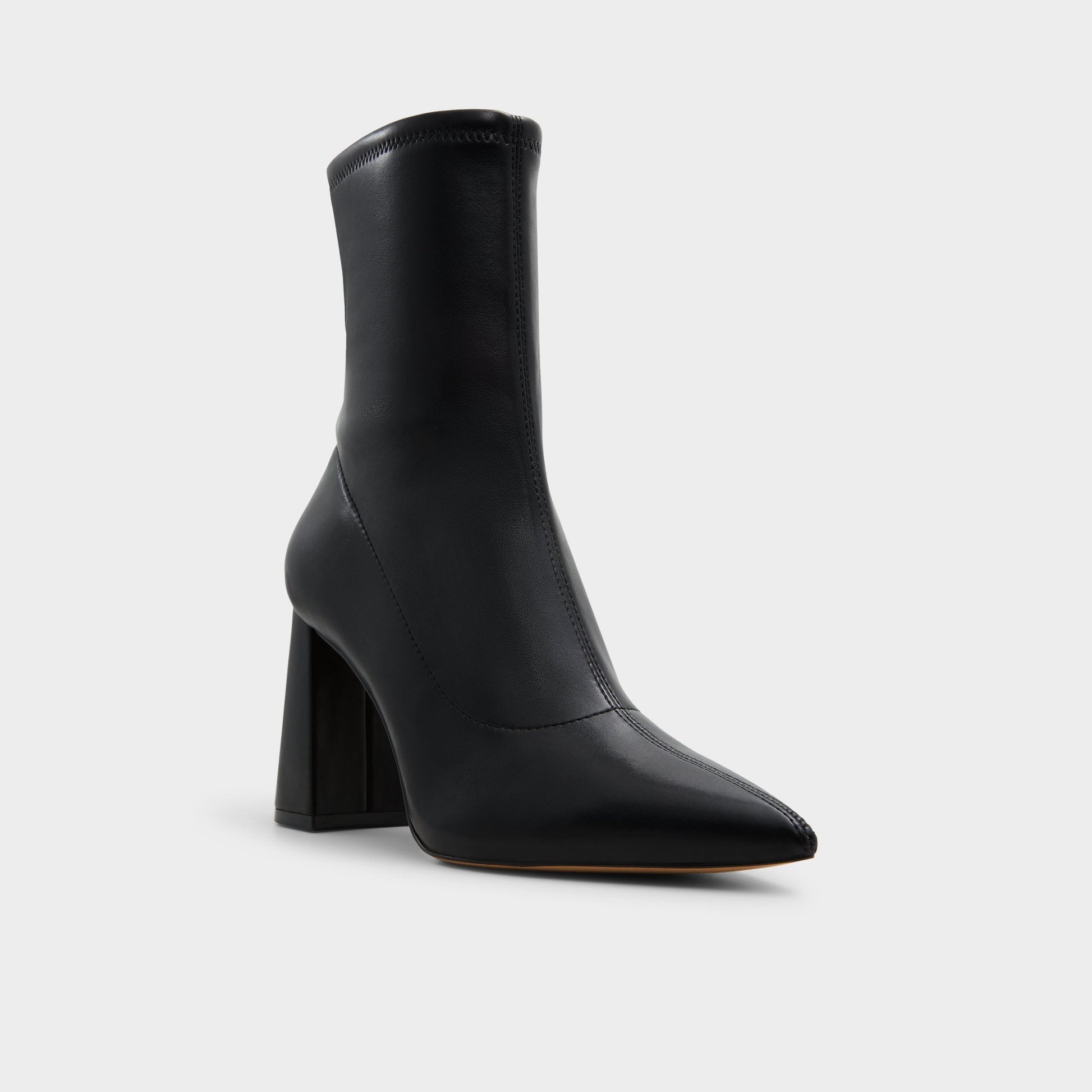 Three-quarter angle of Black Figtree Ankle boot's front side