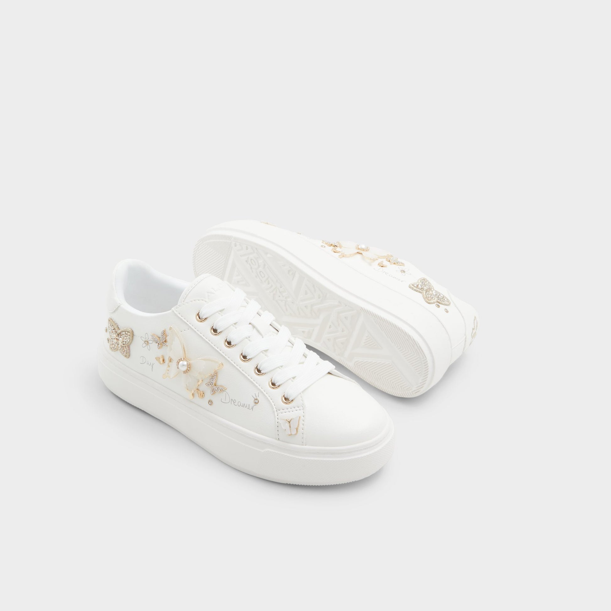 Highlighted view of a pair of White Pearlwing Low top sneakers
