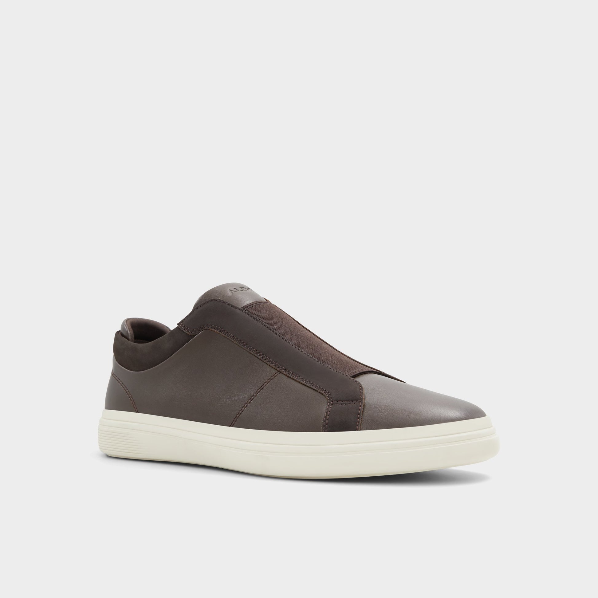 Three-quarter angle of Dark brown Aros Slip-on sneaker's front side