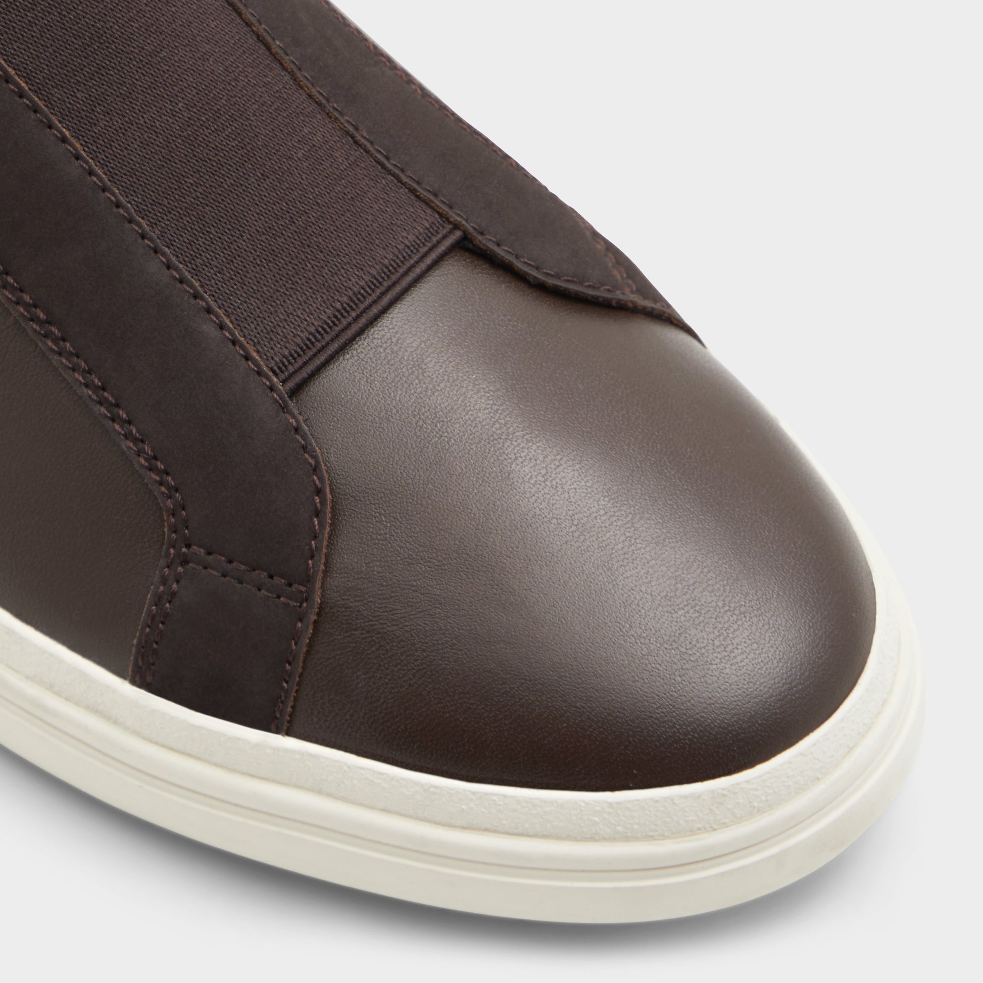 Close-up of the Dark brown Aros Slip-on sneaker