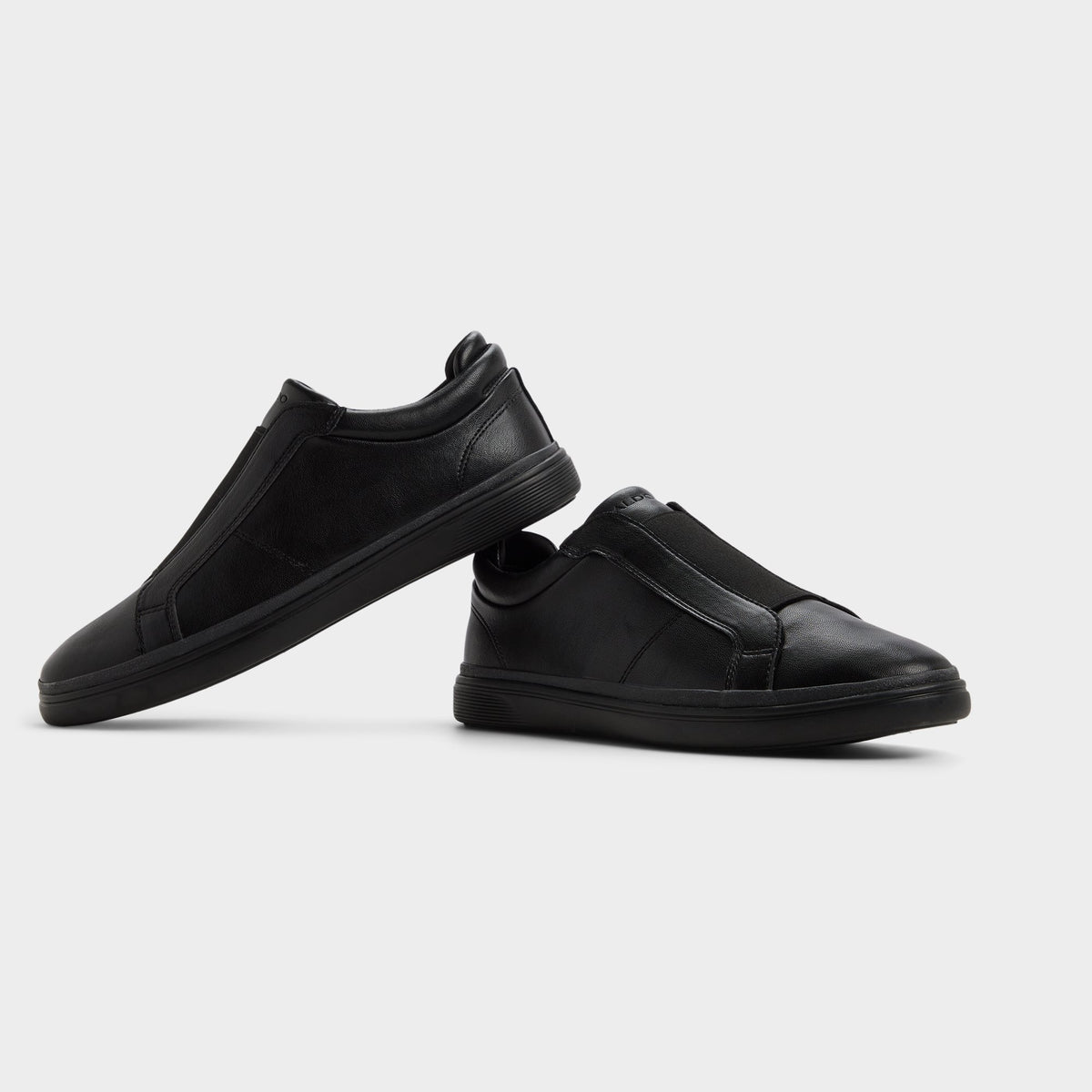 Highlighted view of a pair of Black/black Aros Slip-on sneakers