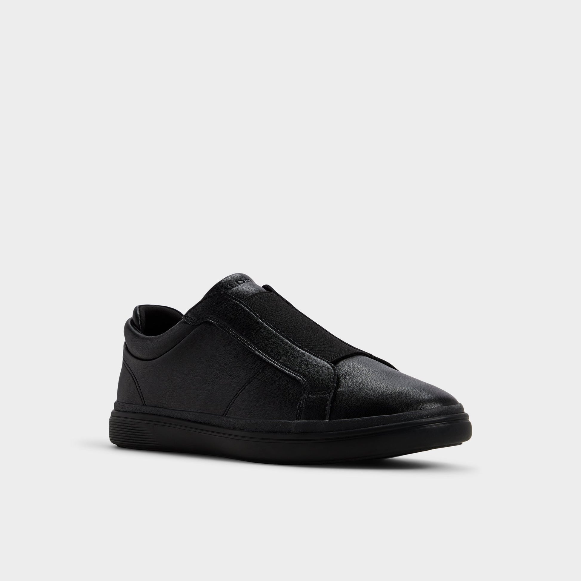 Three-quarter angle of Black/black Aros Slip-on sneaker's front side