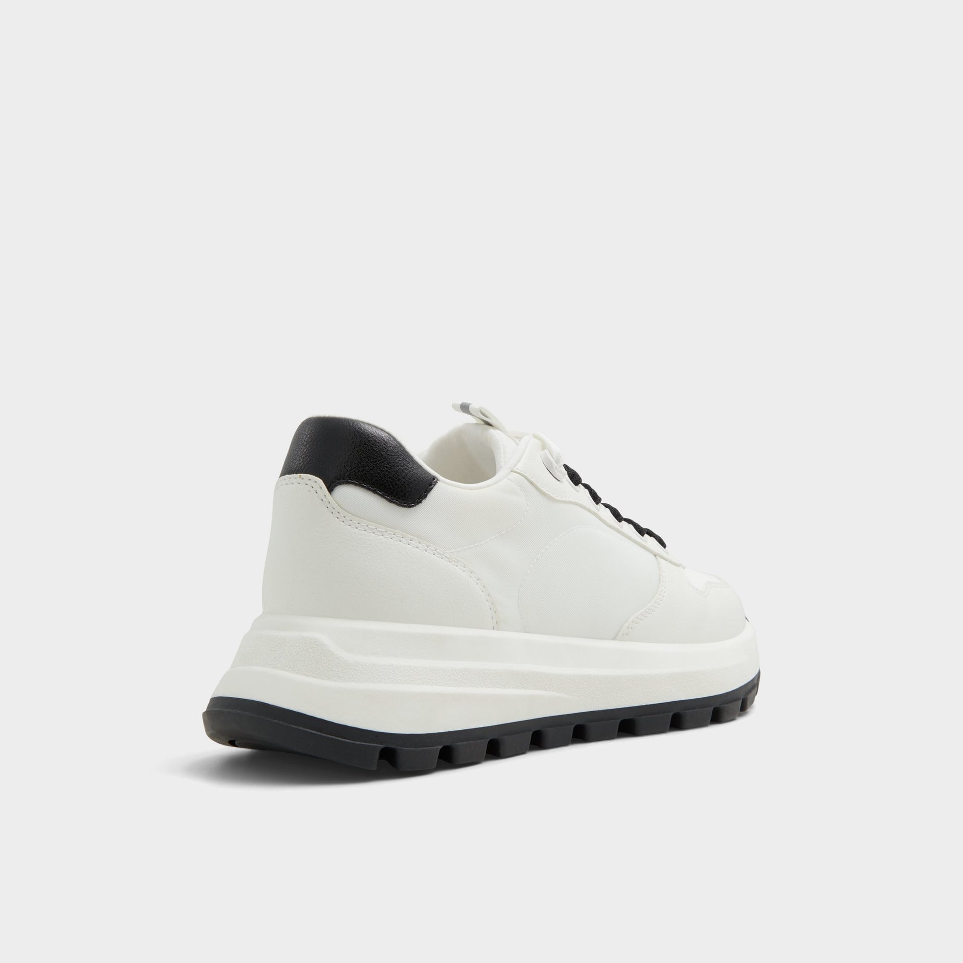 Three-quarter angle of White Lisette Jogger sneaker's back side