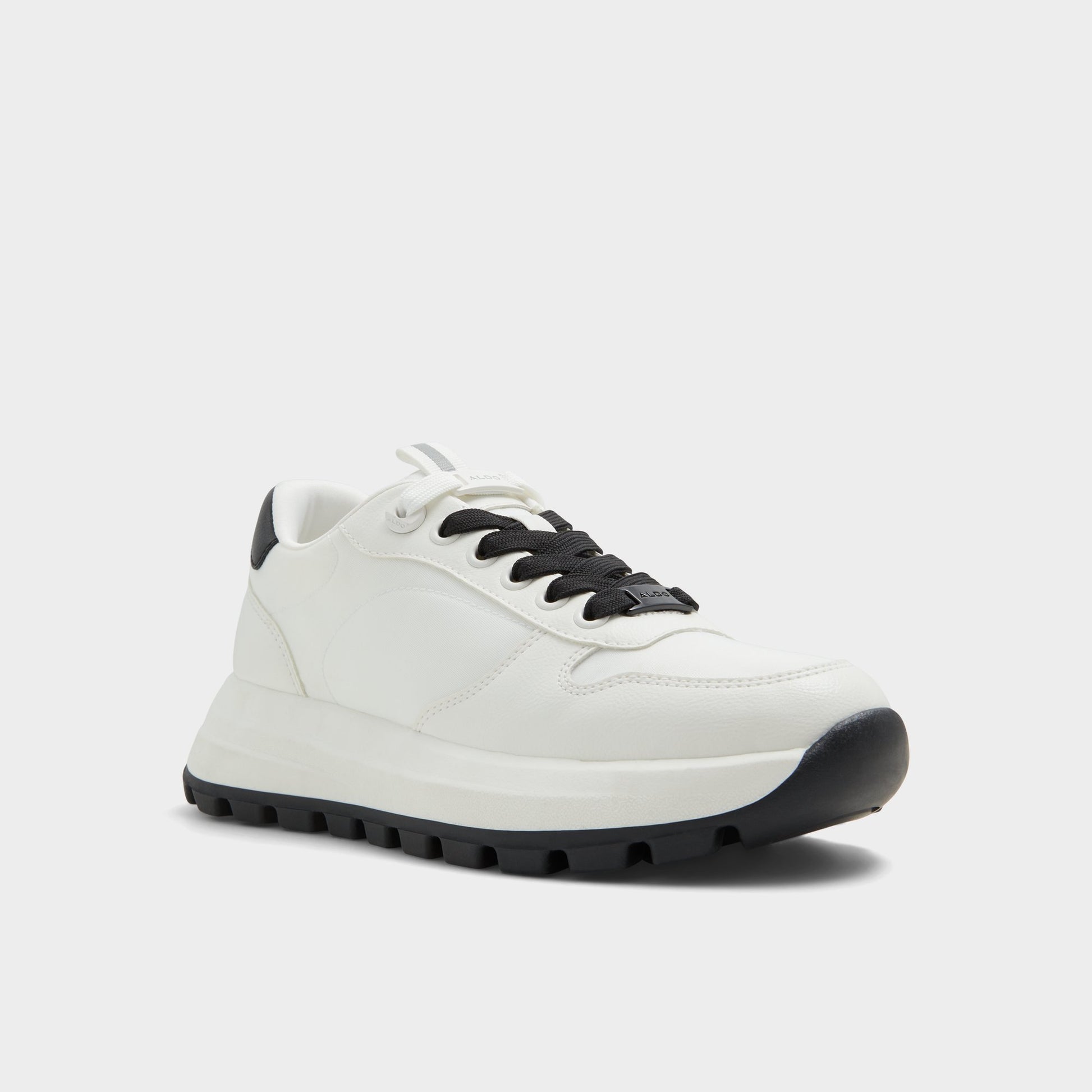 Three-quarter angle of White Lisette Jogger sneaker's front side