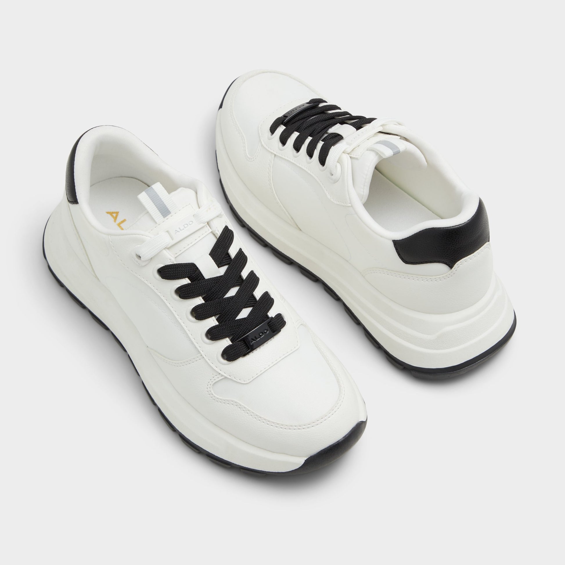 Highlighted view of a pair of White Lisette Jogger sneakers