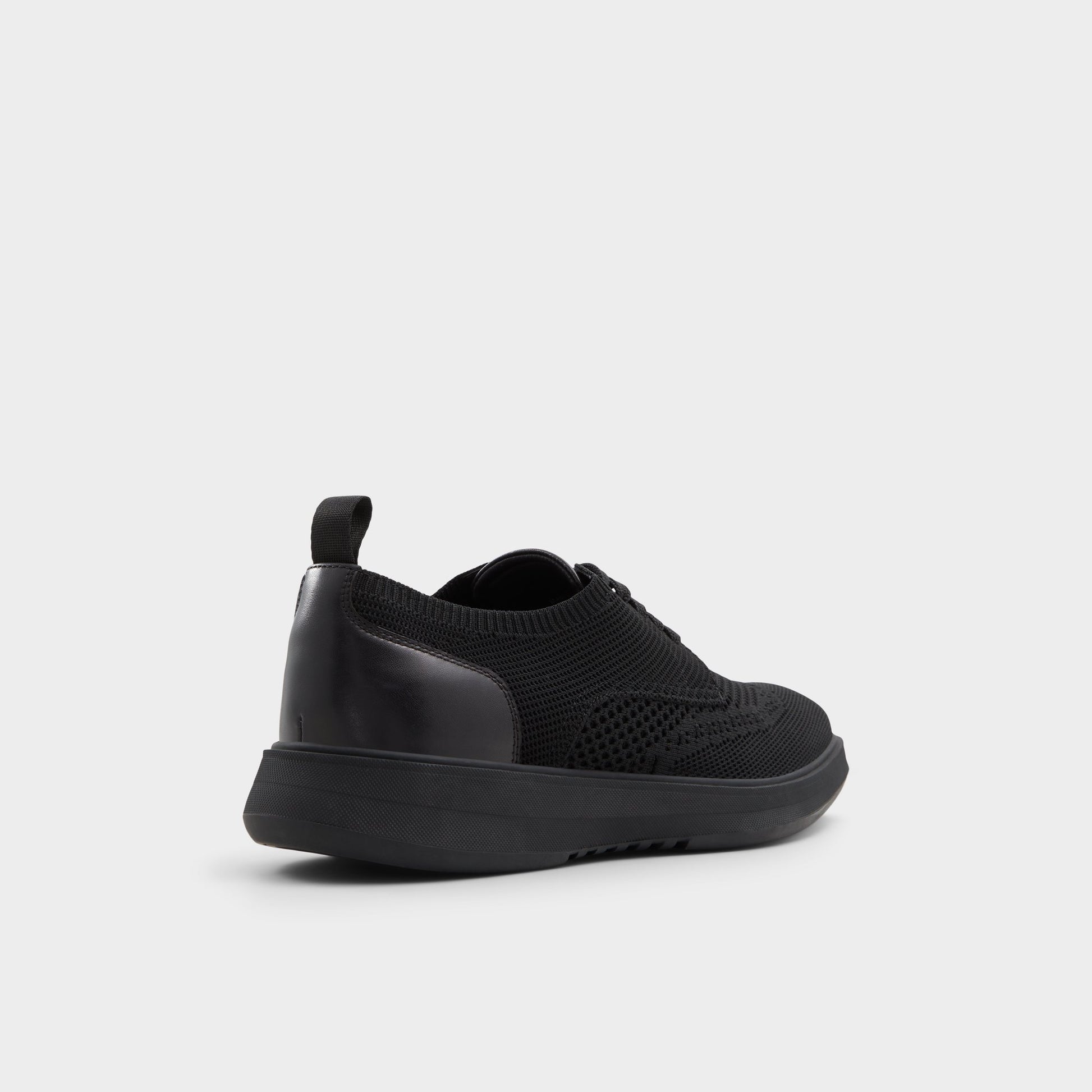 Three-quarter angle of Black Enry Oxford shoe's back side