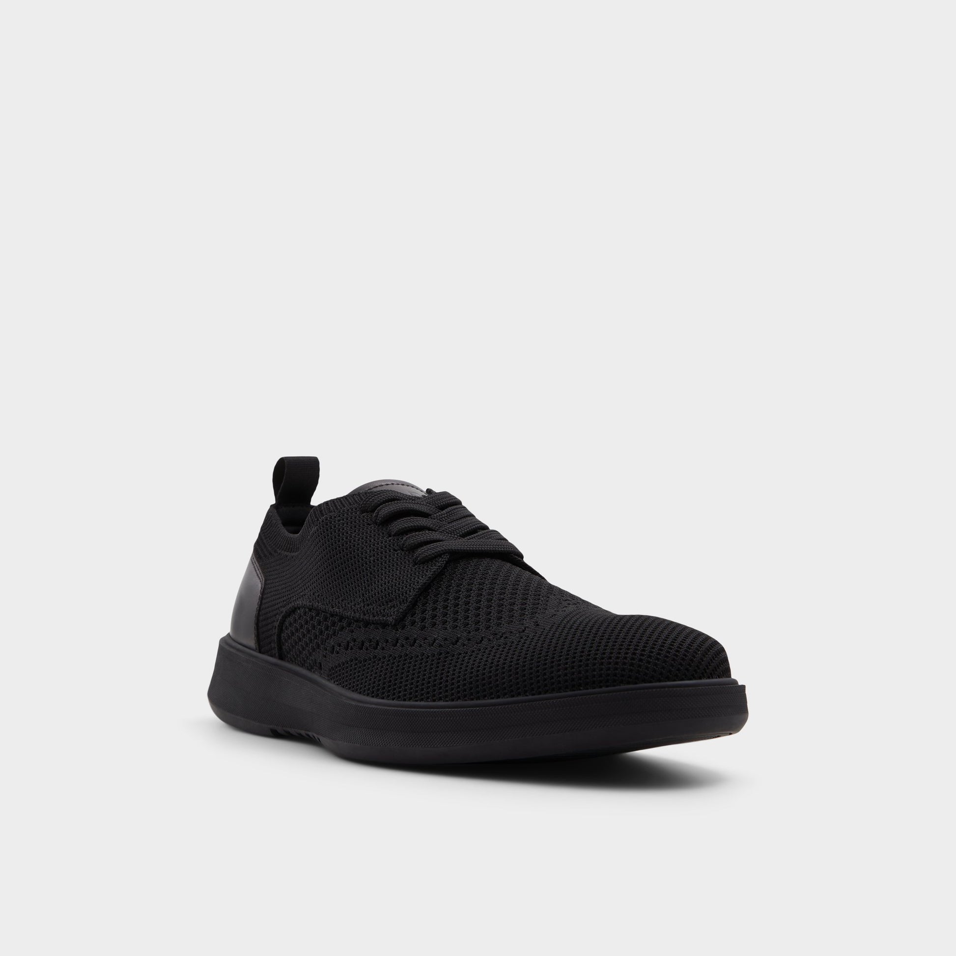 Three-quarter angle of Black Enry Oxford shoe's front side