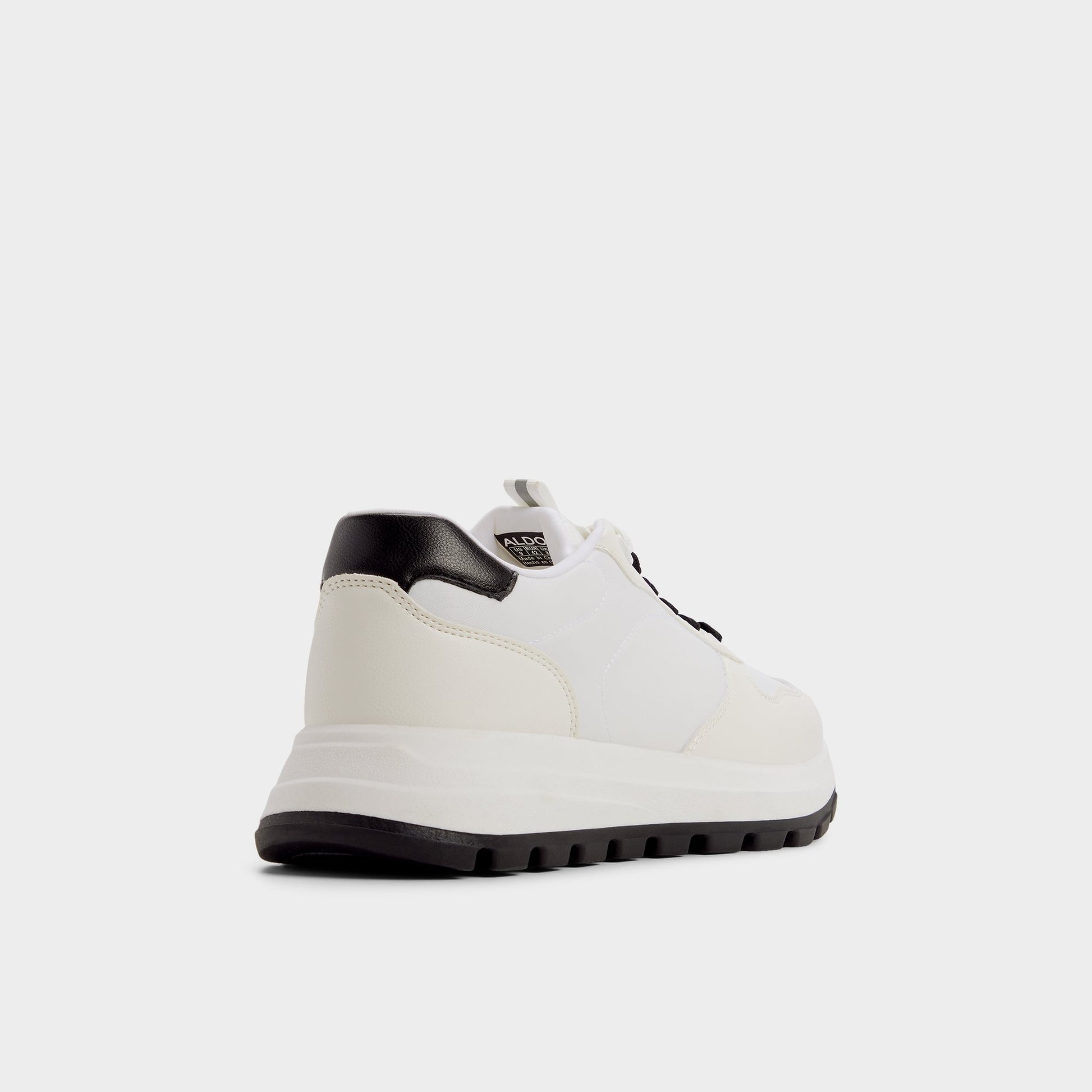 Three-quarter angle of White Casimir Jogger sneaker's back side