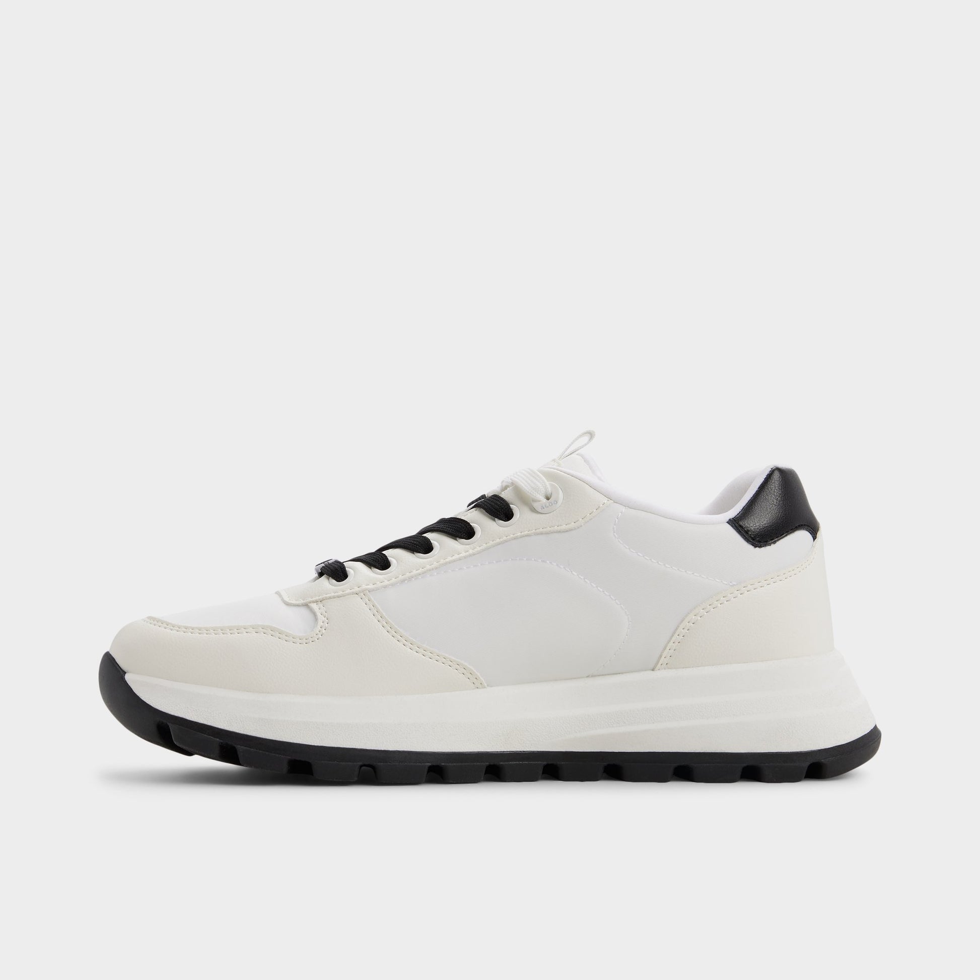 Side view of White Casimir Jogger sneaker