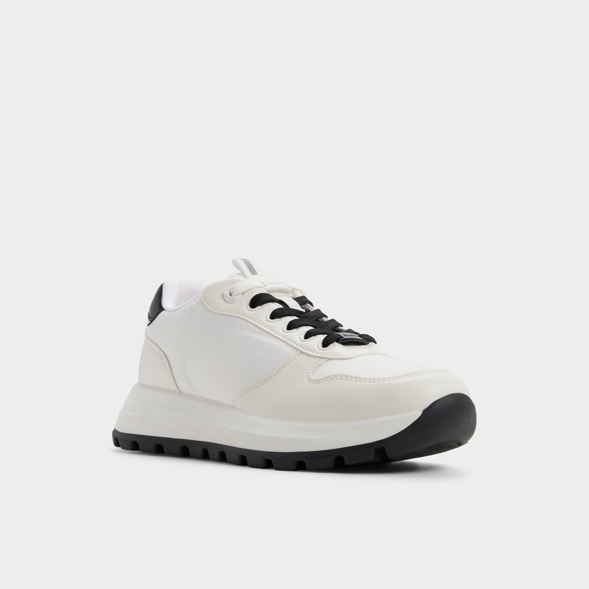 Three-quarter angle of White Casimir Jogger sneaker's front side