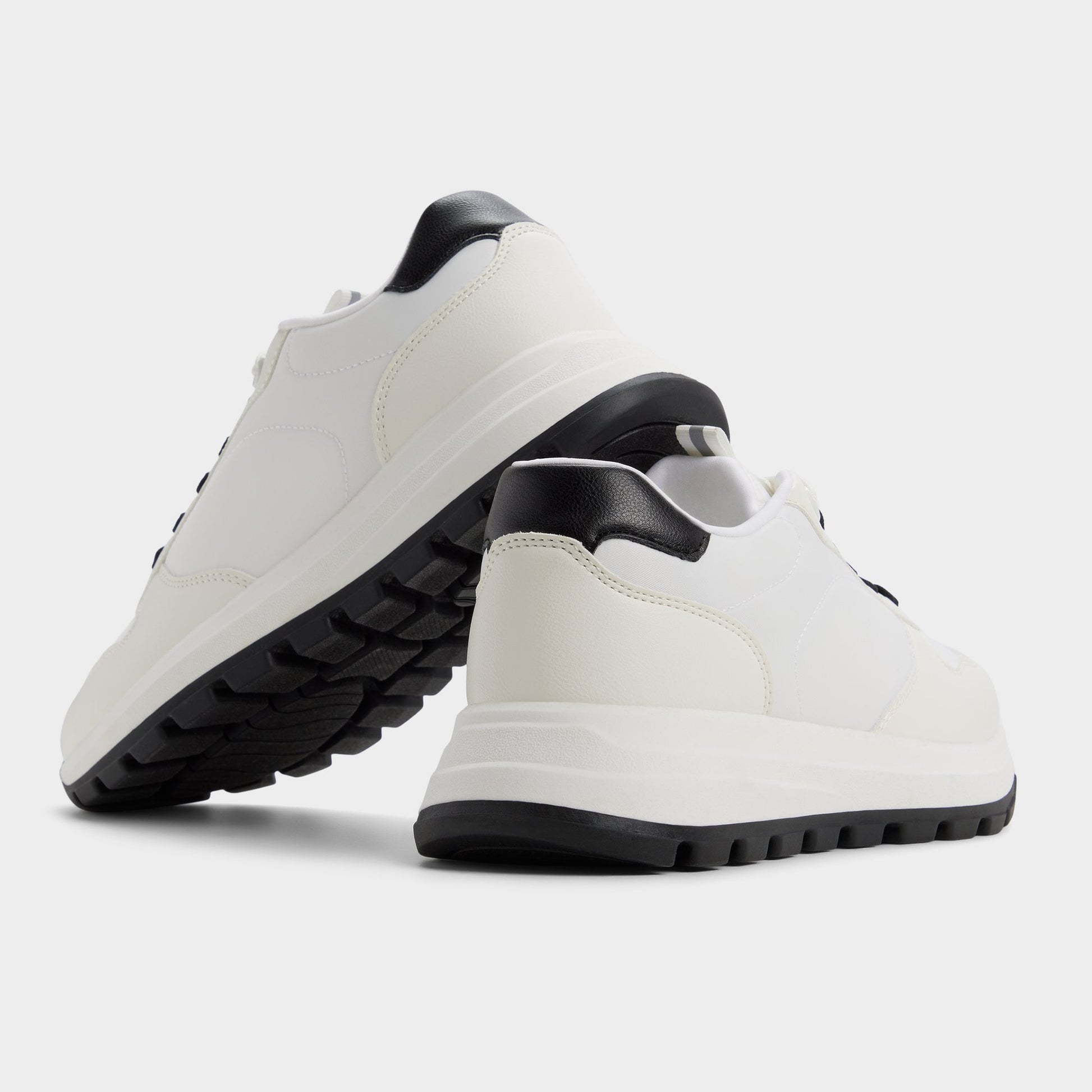 Highlighted view of a pair of White Casimir Jogger sneakers