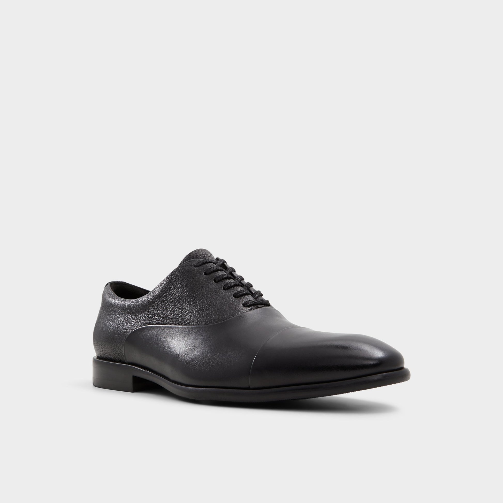 Three-quarter angle of Open Black Meekes Oxford shoe's front side