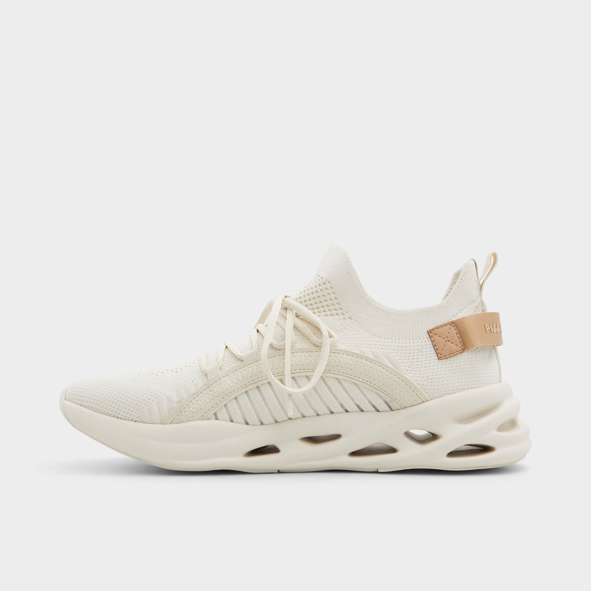 Side view of White/Bone Motionx Jogger sneaker