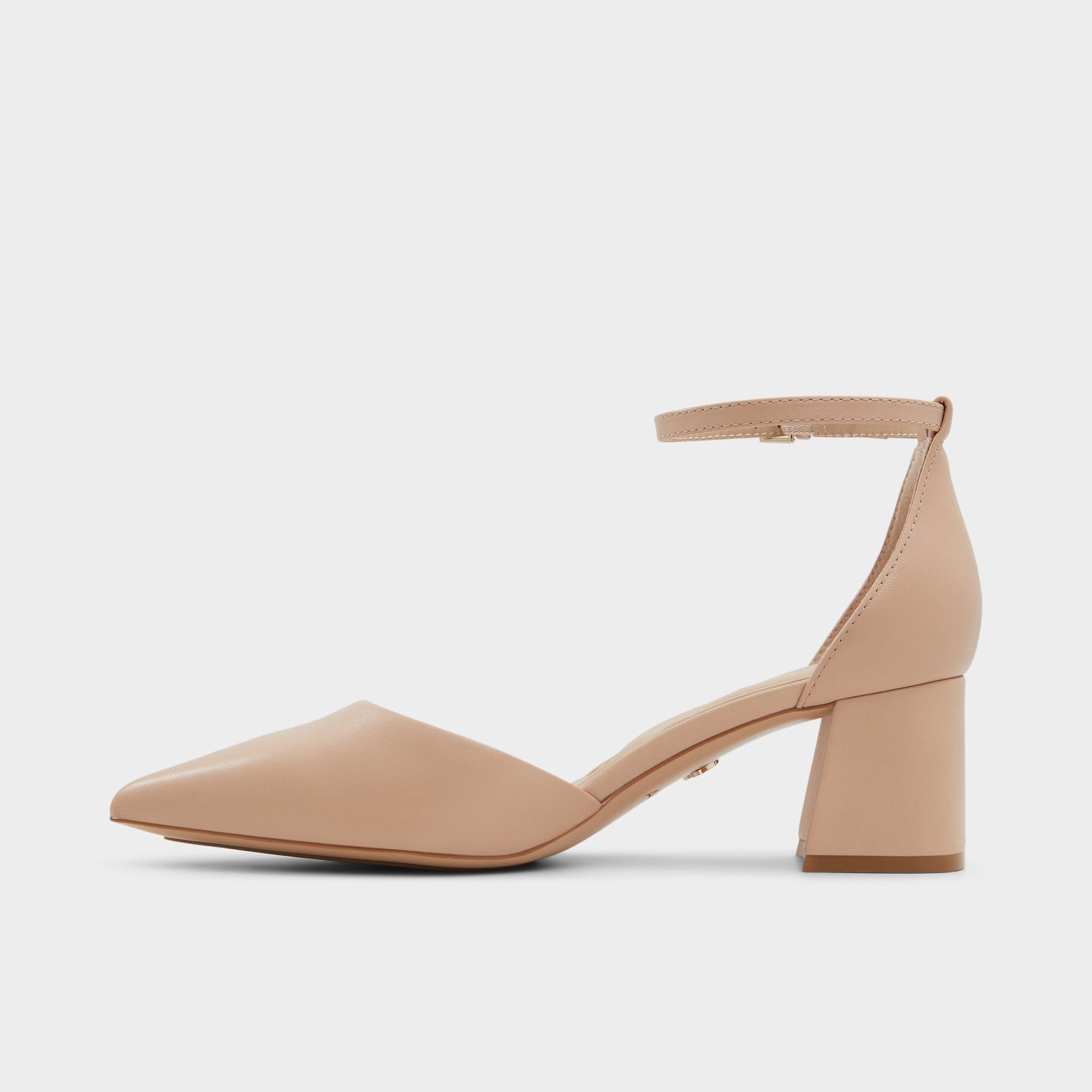 Side view of Bone Uneral High heeled shoe