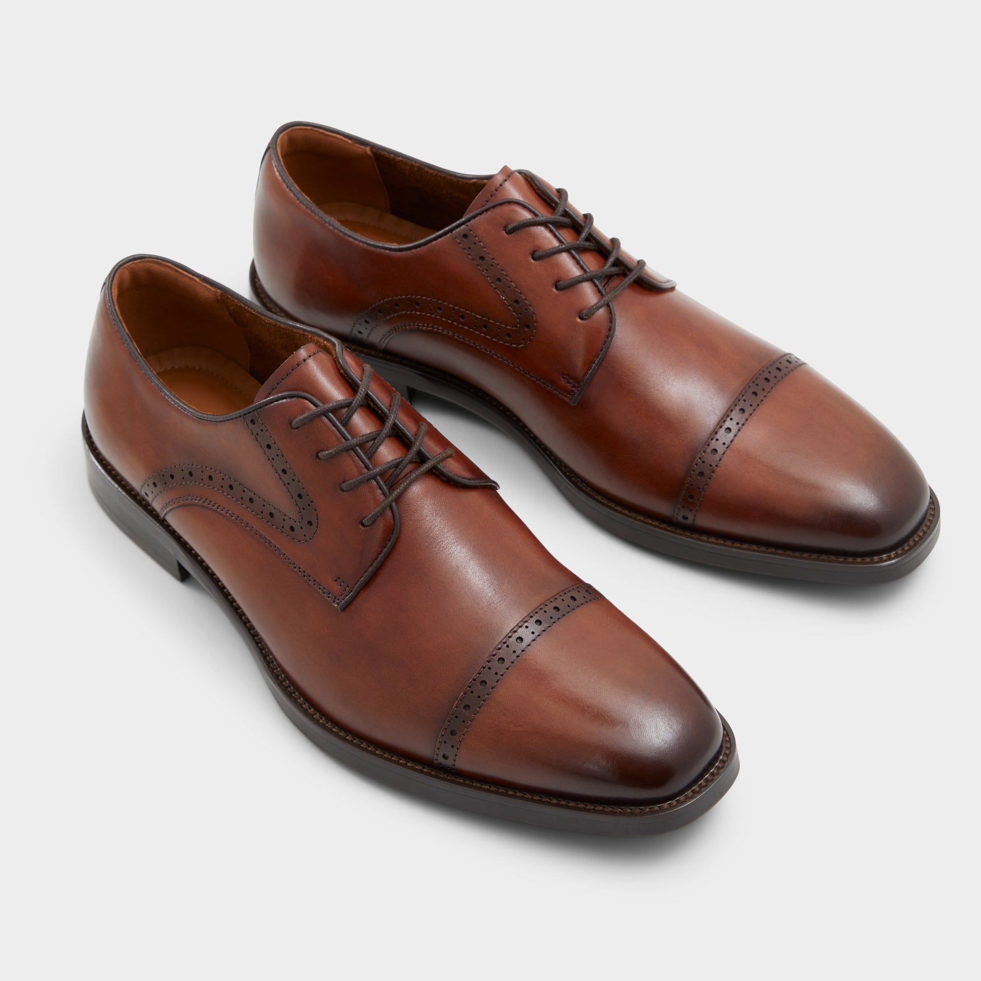Highlighted view of a pair of Cognac Donald Derby shoes