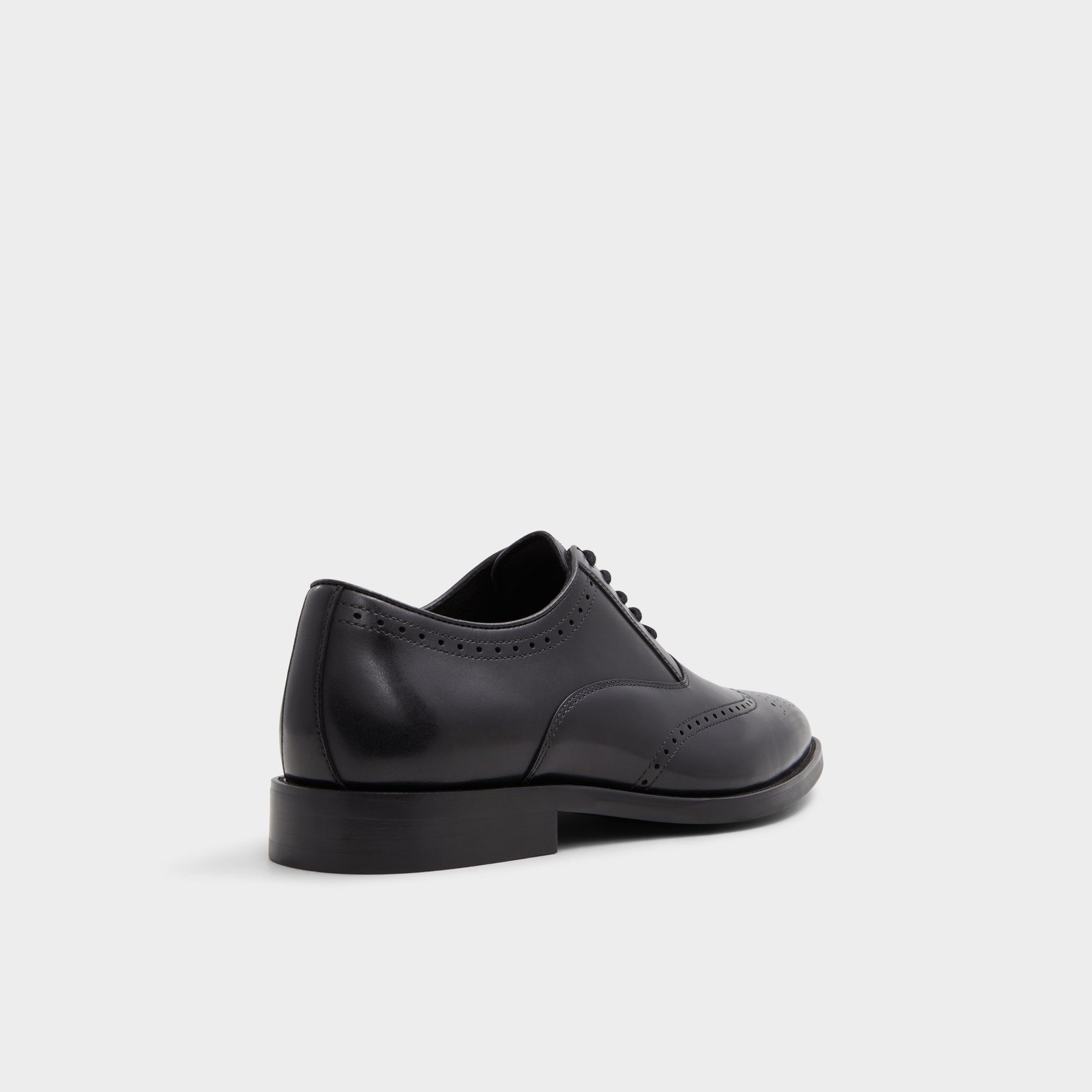 Three-quarter angle of Black Donald Derby shoe's back side