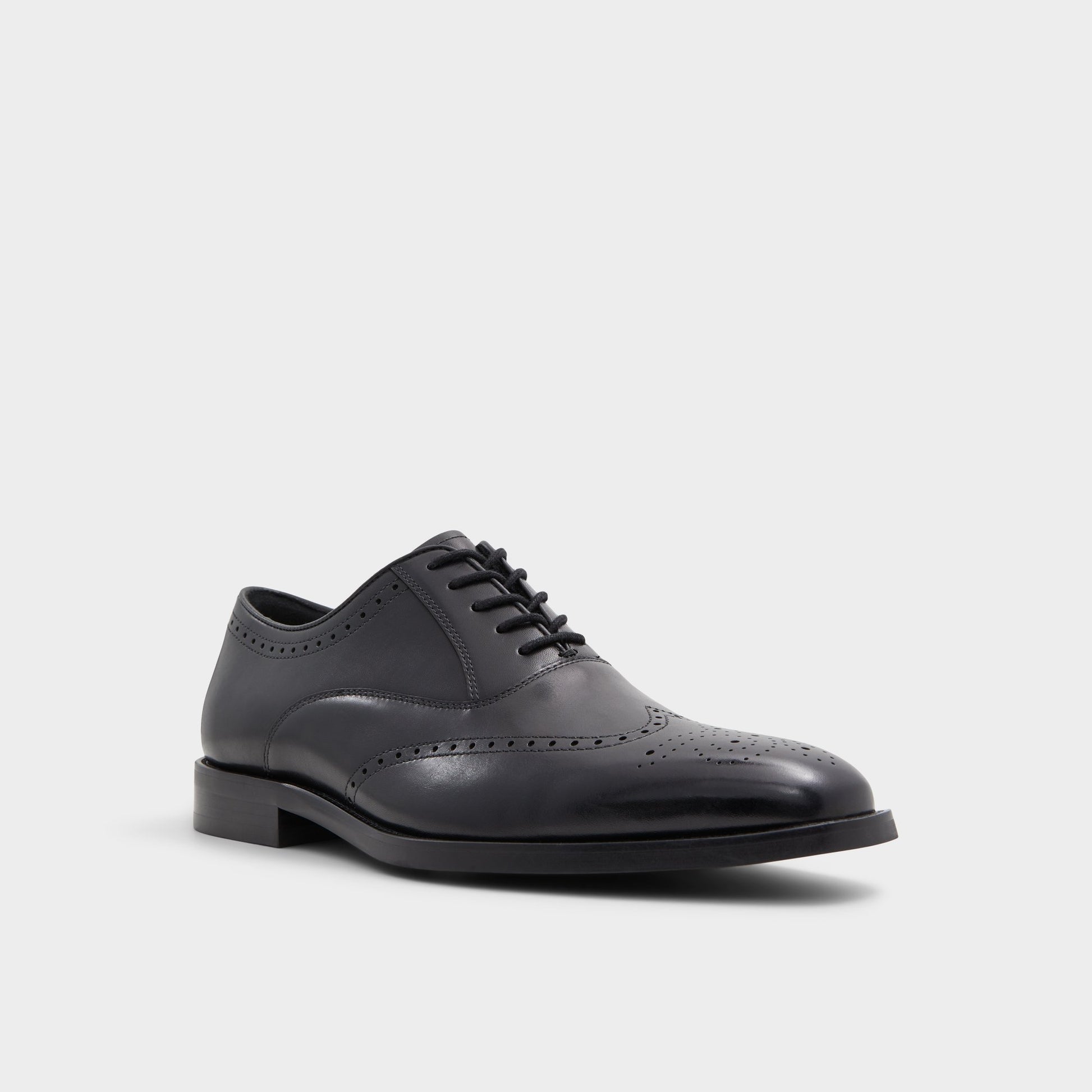 Three-quarter angle of Black Donald Derby shoe's front side