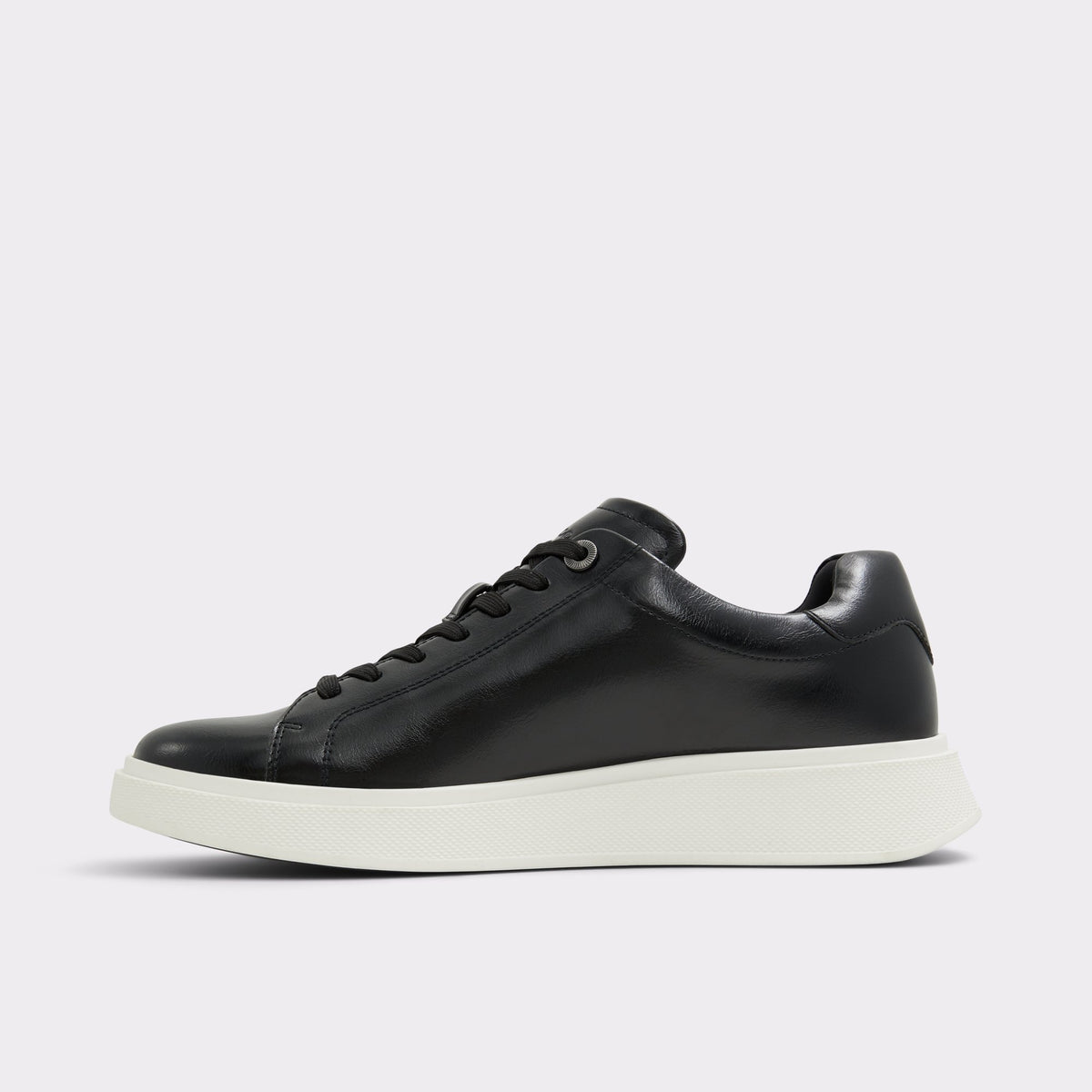 Side view of Black/Black Magnus Low top sneaker