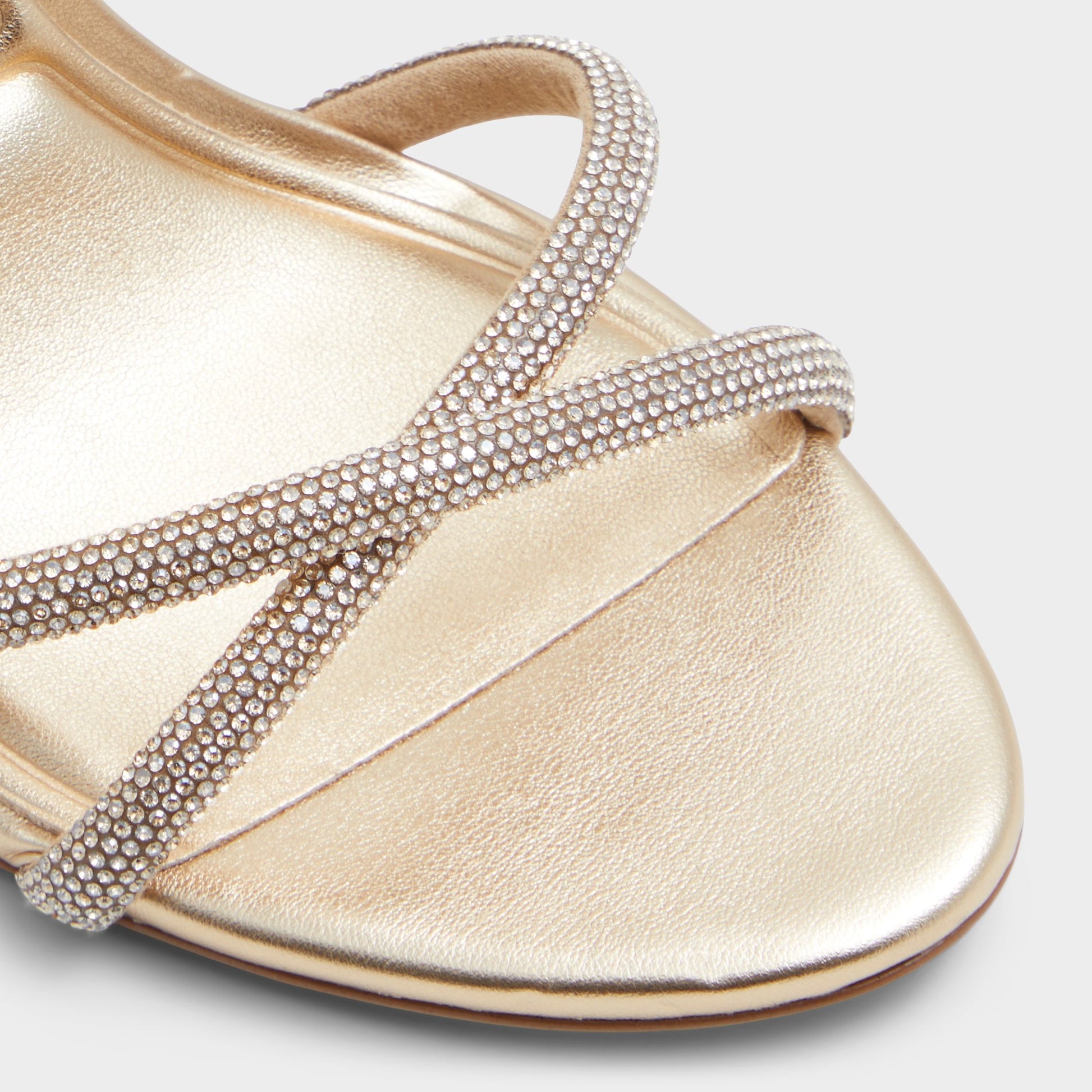 Close-up of the Gold Manaelden Strappy heeled sandal