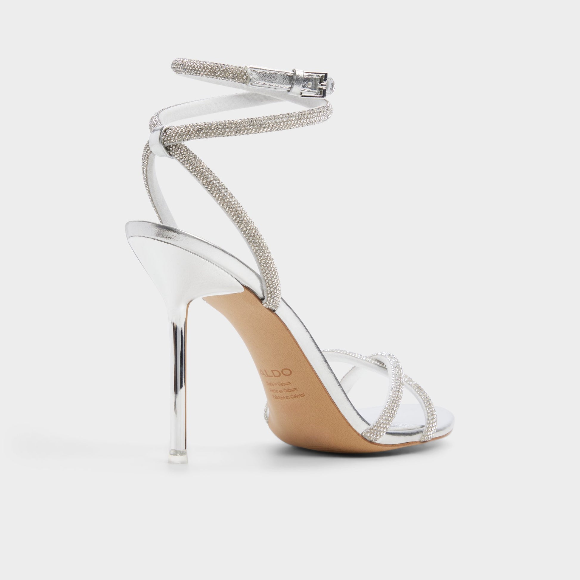 Three-quarter angle of Silver Manaelden Strappy heeled sandal's back side