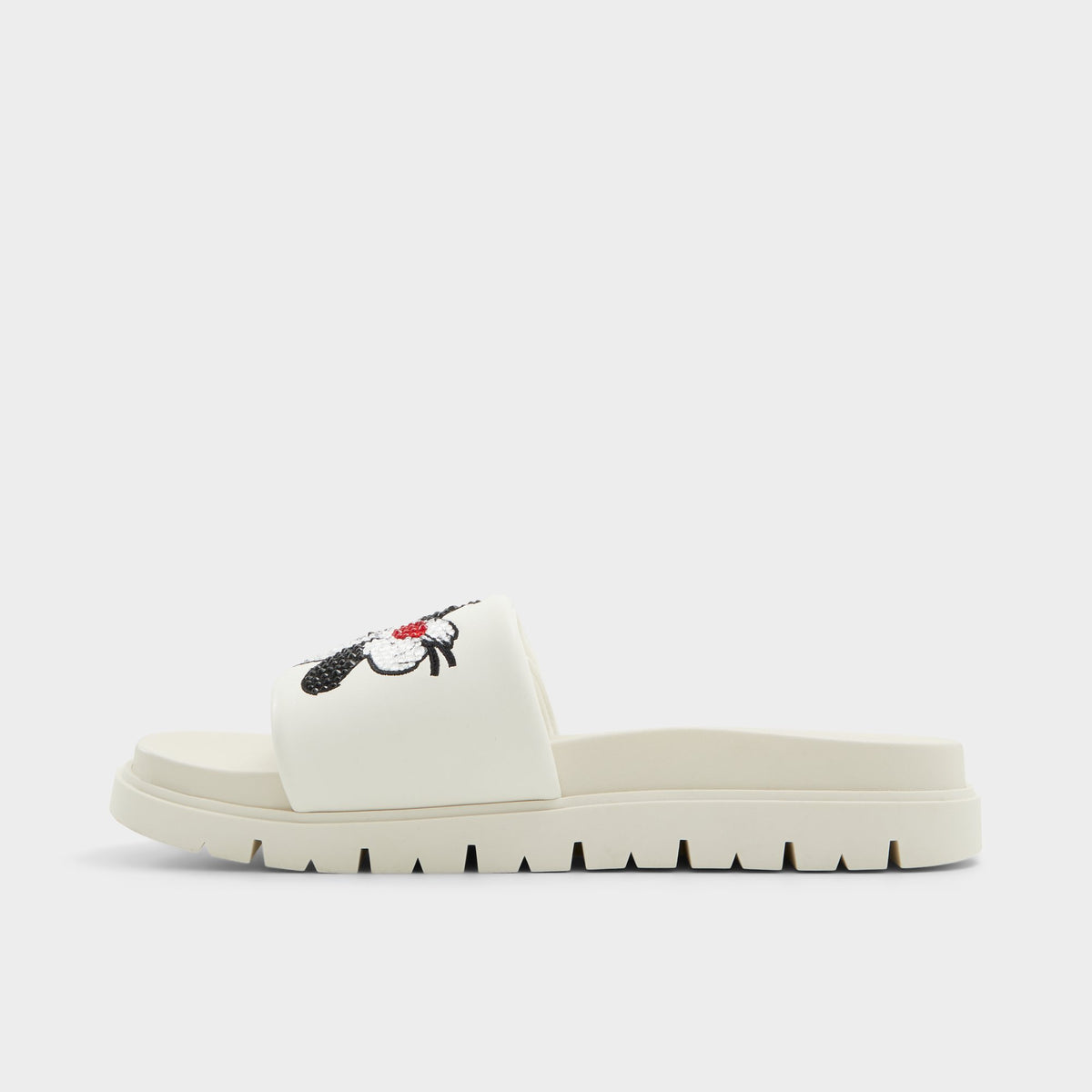 Side view of White Ltslides Looney Tunesâ¢ x ALDO