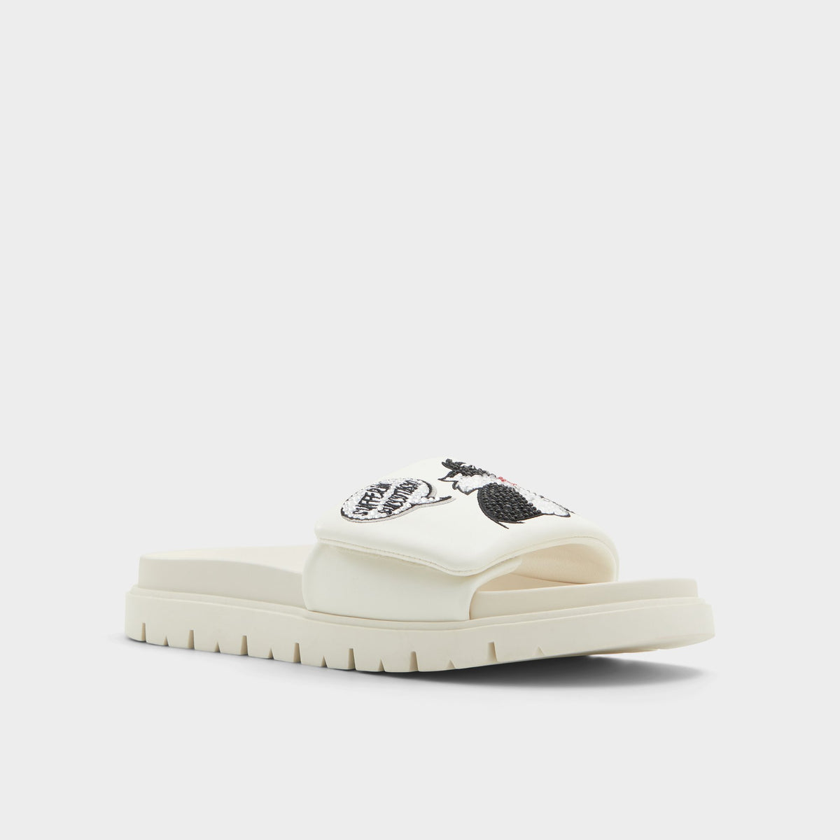 Three-quarter angle of White Ltslides Looney Tunesâ¢ x ALDO's front side