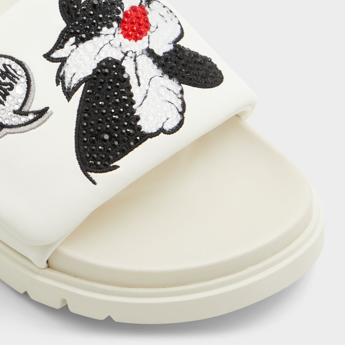Close-up of the White Ltslides Looney Tunesâ¢ x ALDO