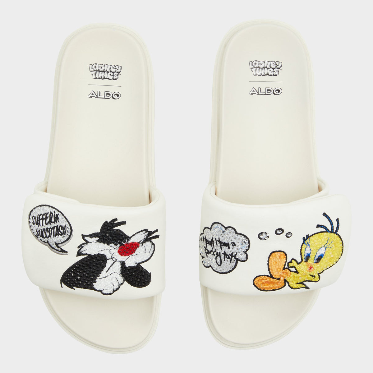 Top-down view of the White Ltslides Looney Tunesâ¢ x ALDO