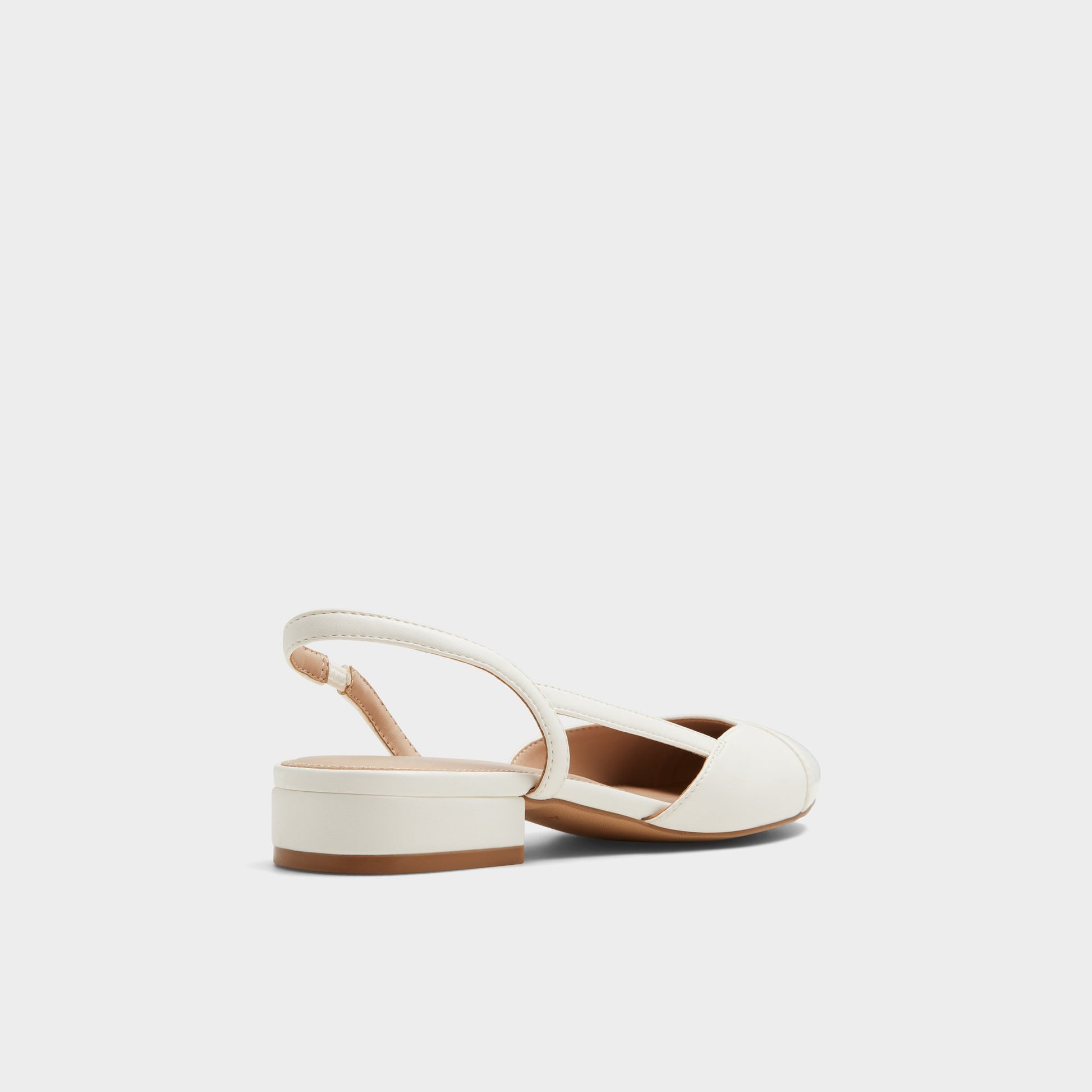 Three-quarter angle of White Clementinne Sling back high heel's back side