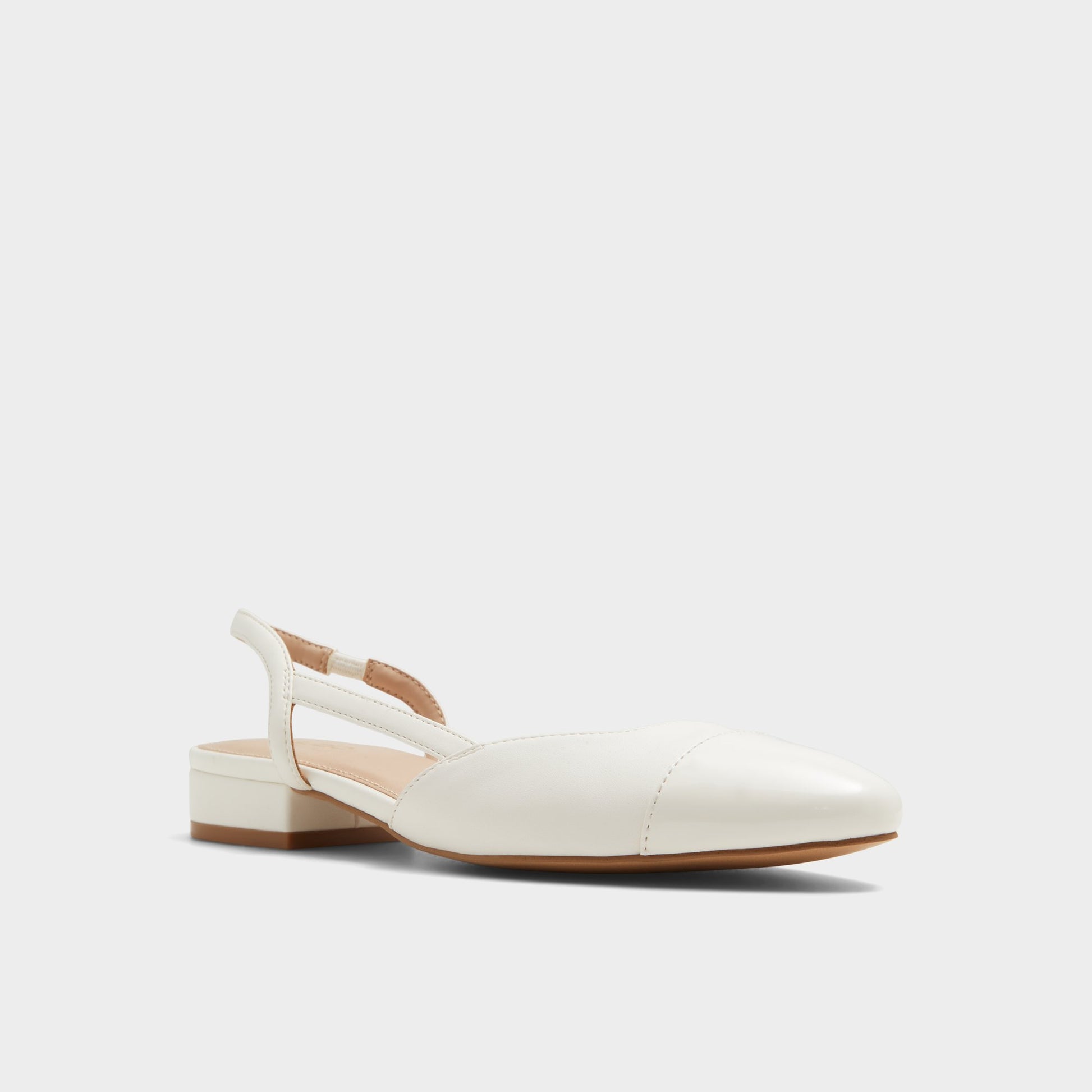 Three-quarter angle of White Clementinne Sling back high heel's front side