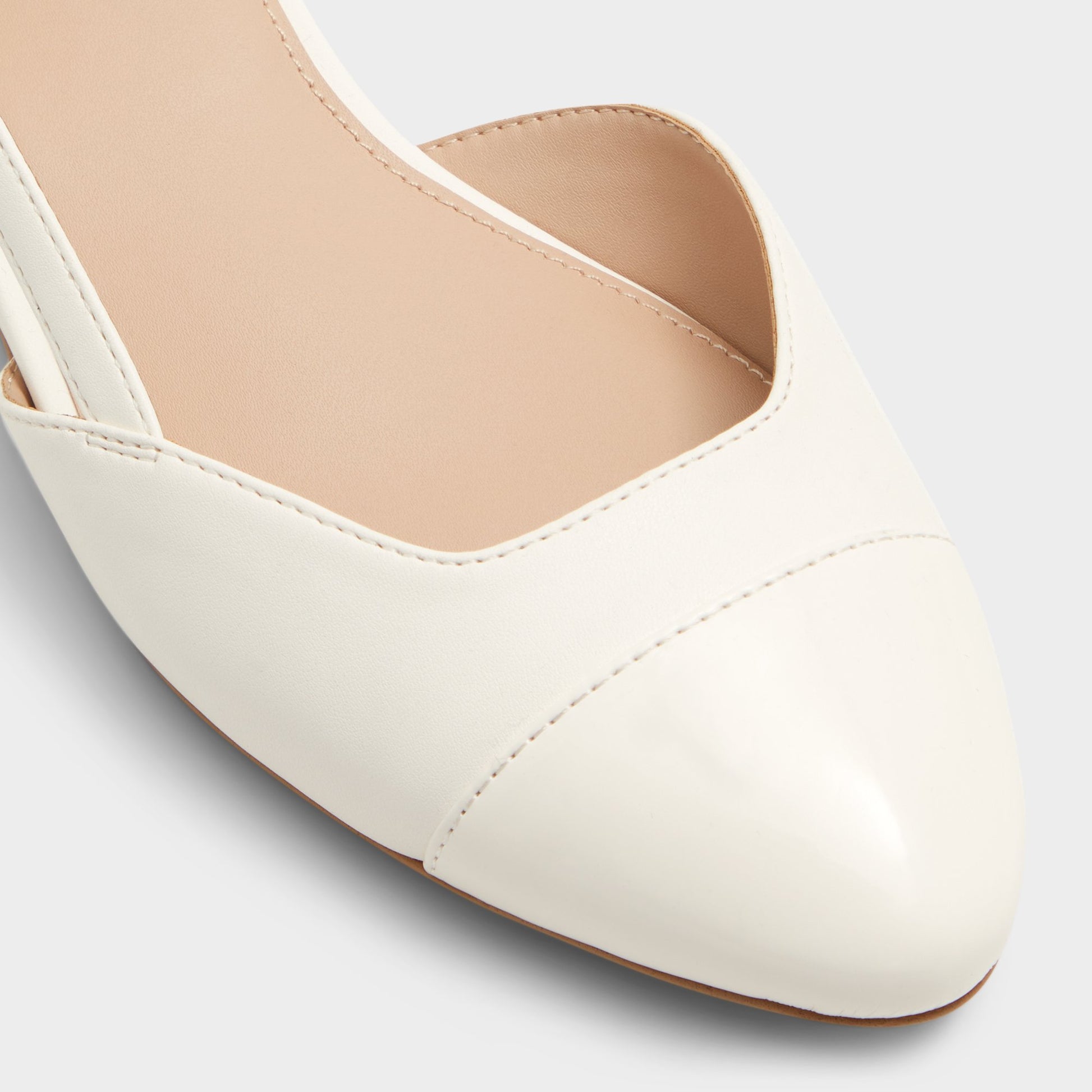 Close-up of the White Clementinne Sling back high heel