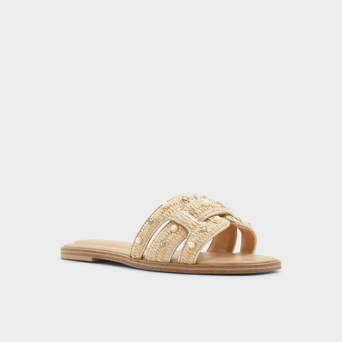 Three-quarter angle of Beige Combo Elenaa Slide sandal's front side
