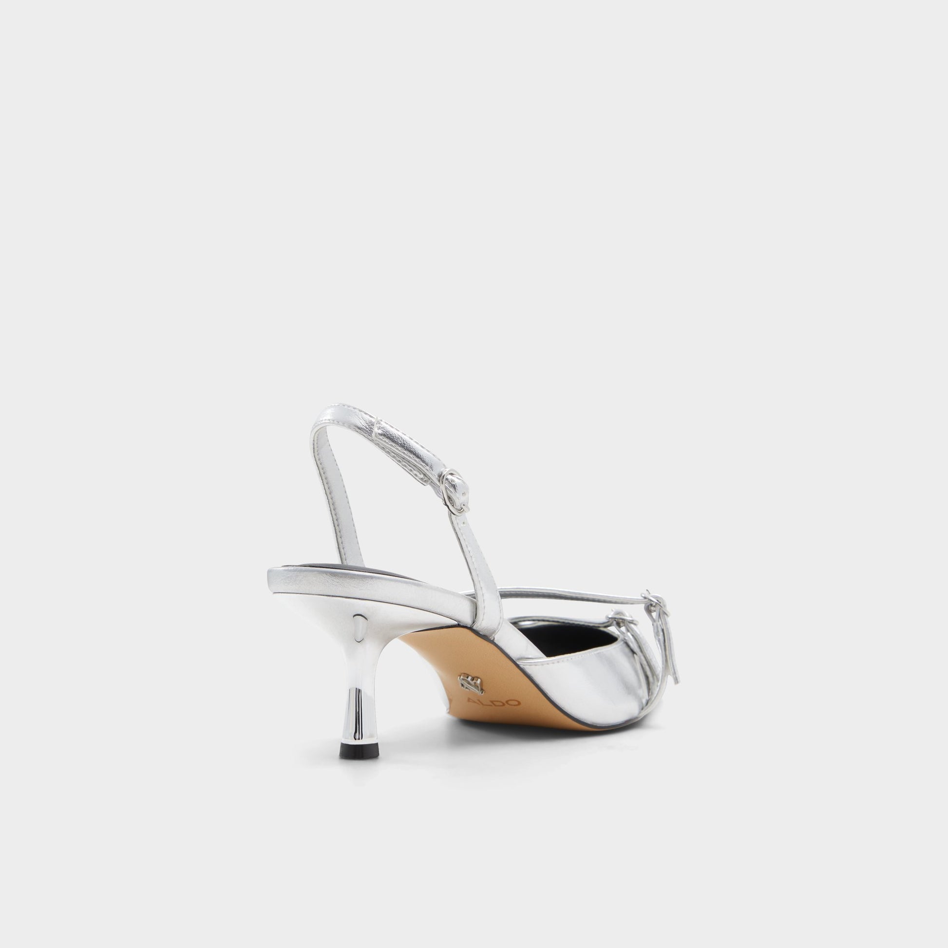 Three-quarter angle of Silver Marietta Slingback heel's back side