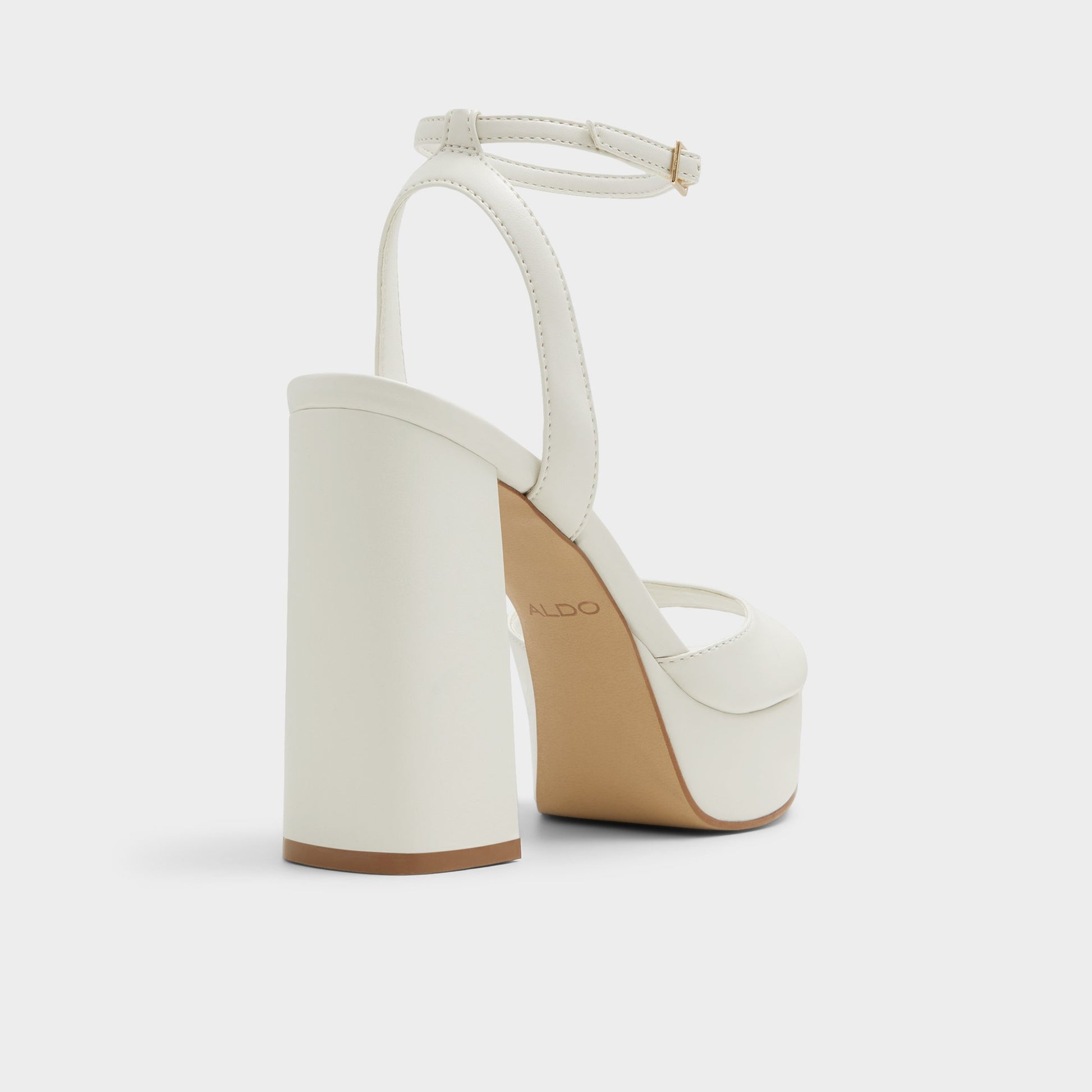Three-quarter angle of White Valoria Strappy heeled sandal's back side