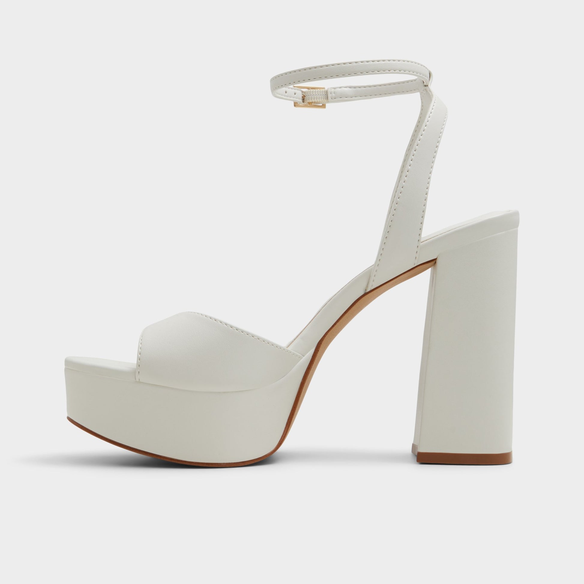Side view of White Valoria Strappy heeled sandal