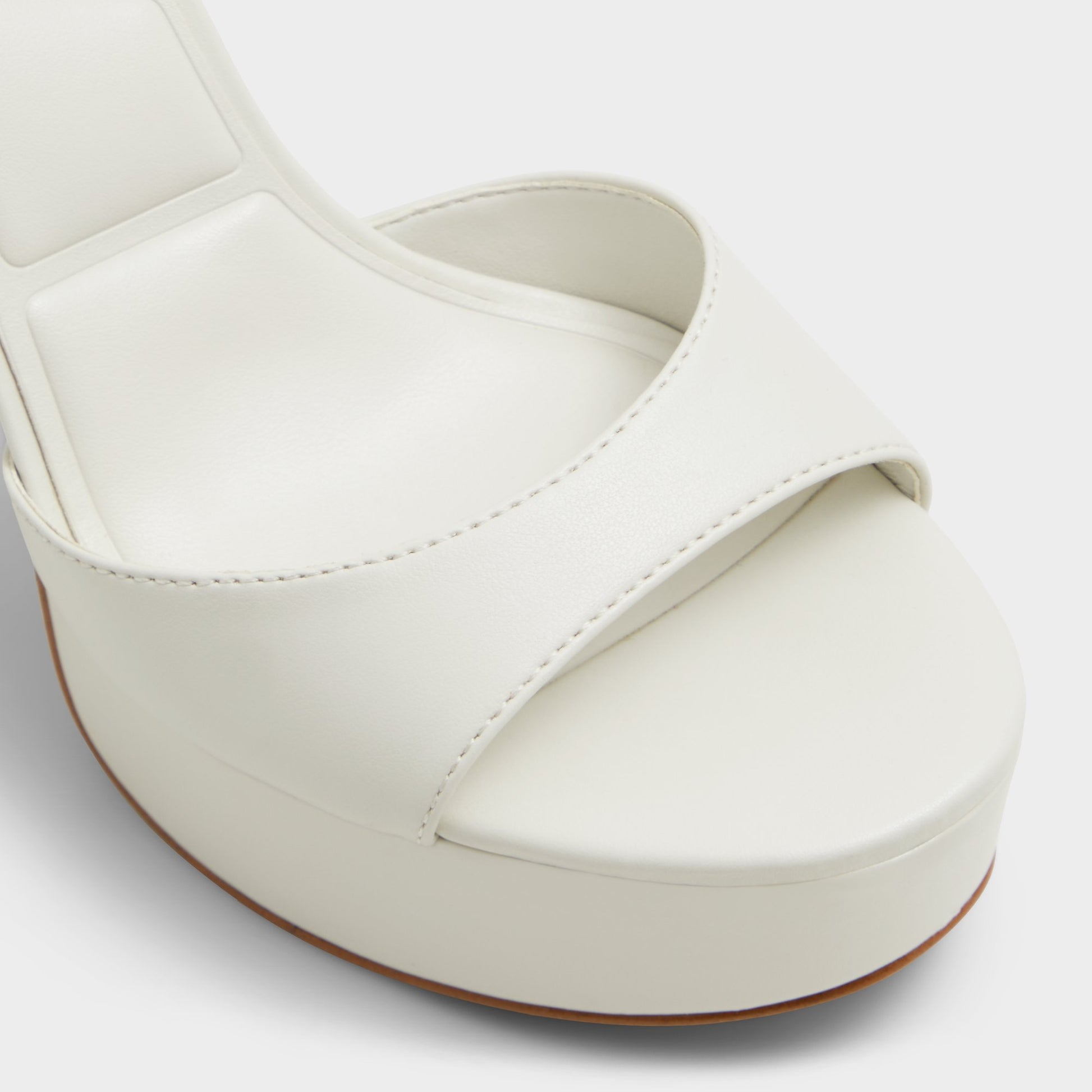 Close-up of the White Valoria Strappy heeled sandal
