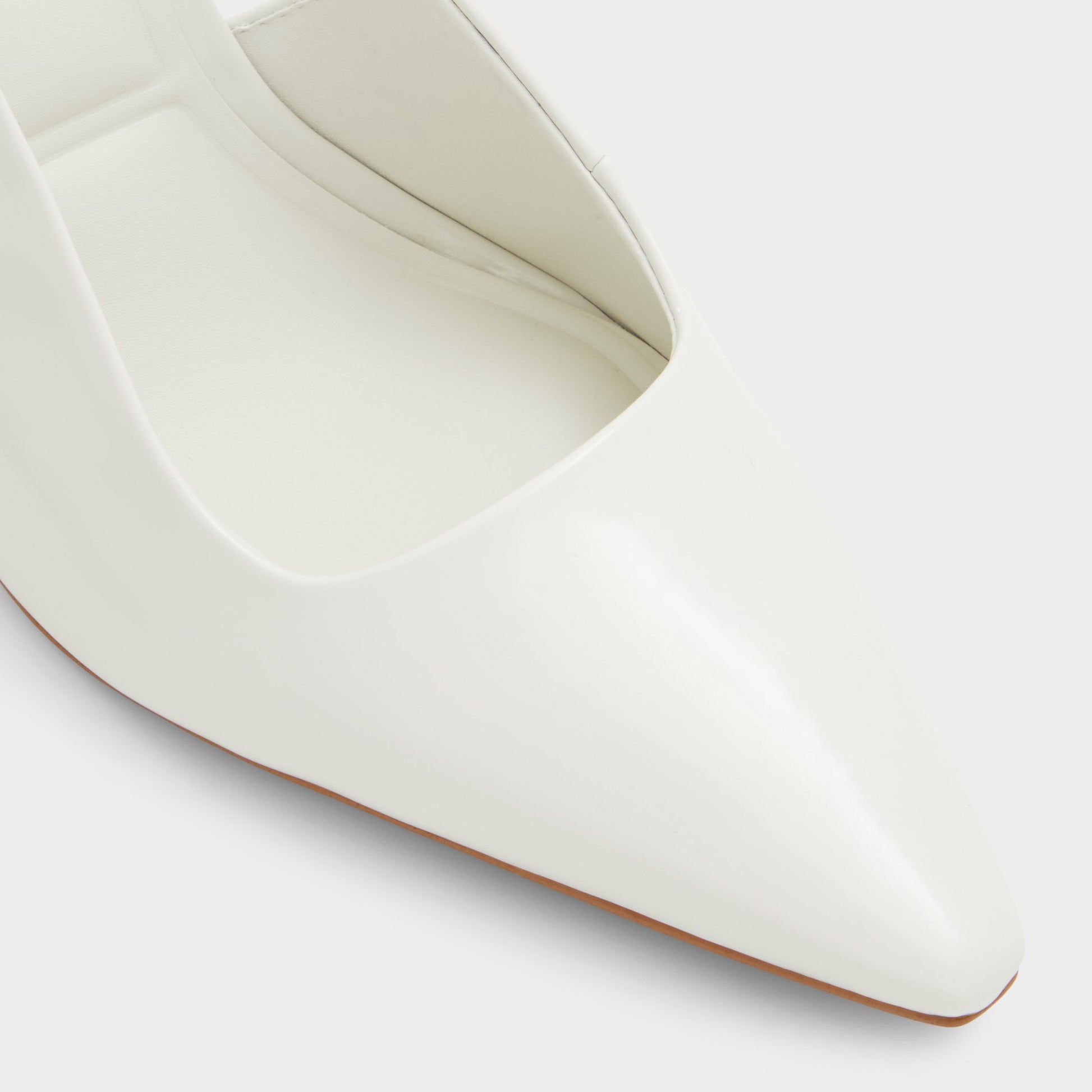 Close-up of the White/Bone Marysa Slingback heel
